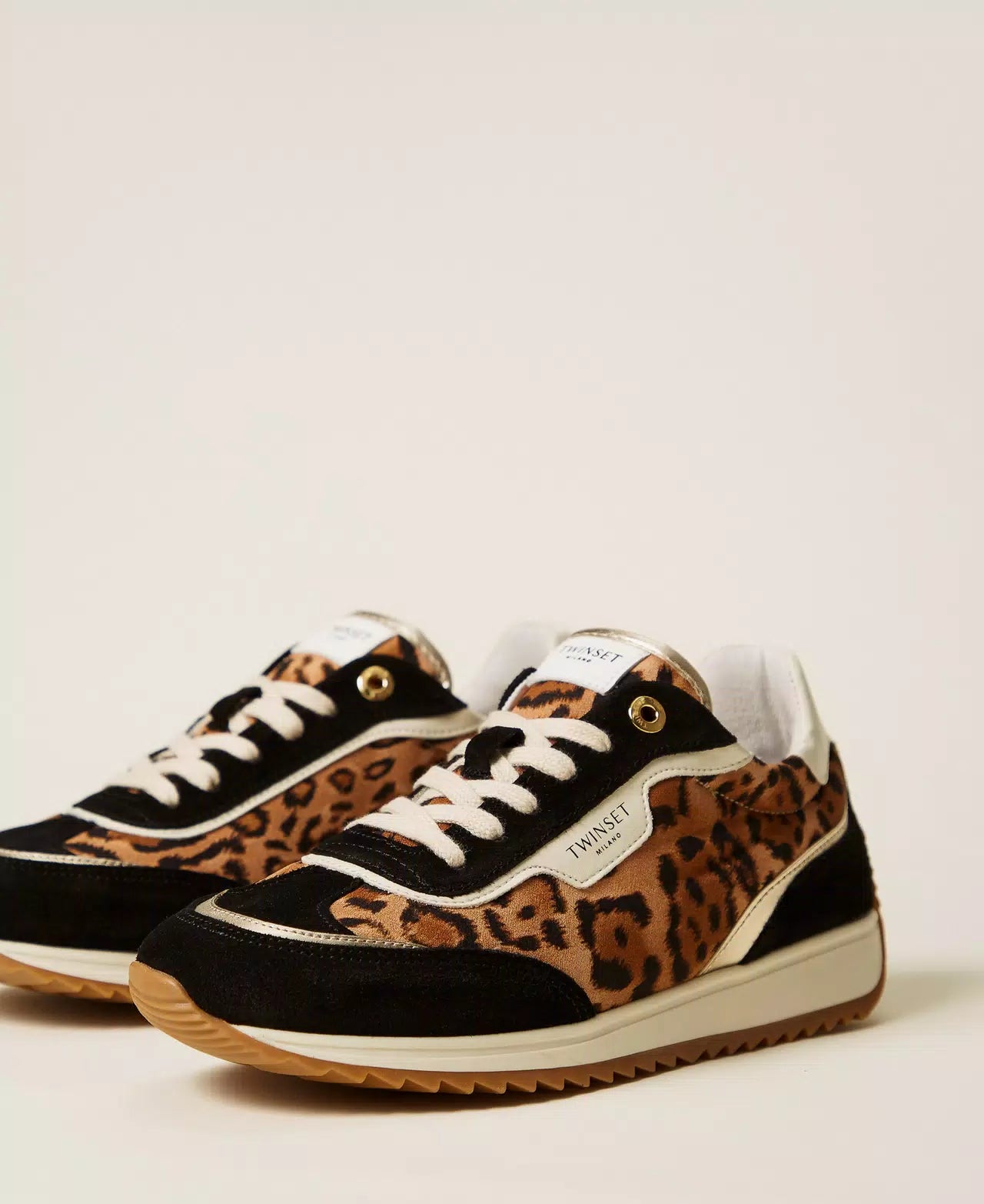 Sneakers in pelle con dettagli animalier