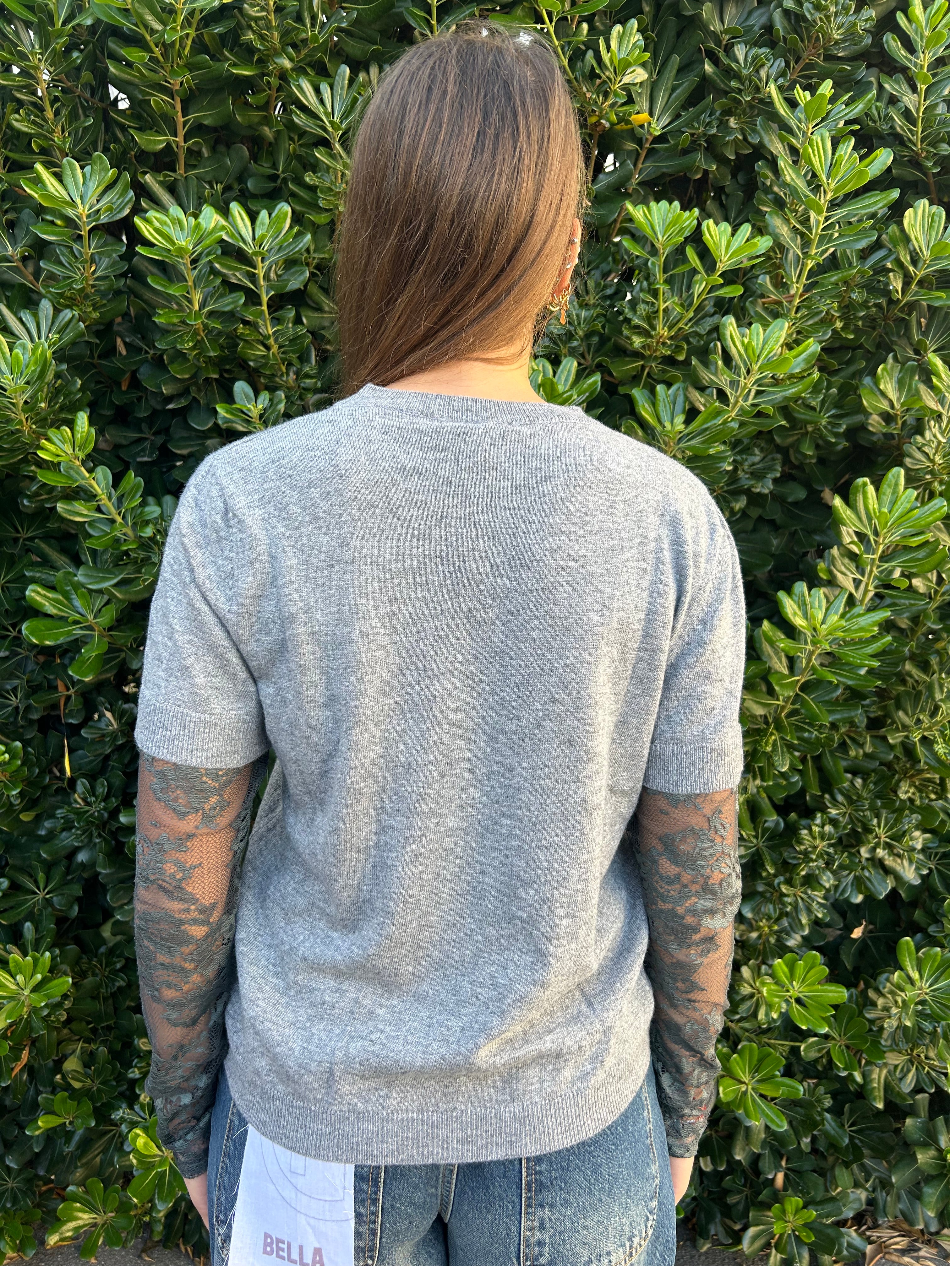 Maglia in lana con maniche in pizzo