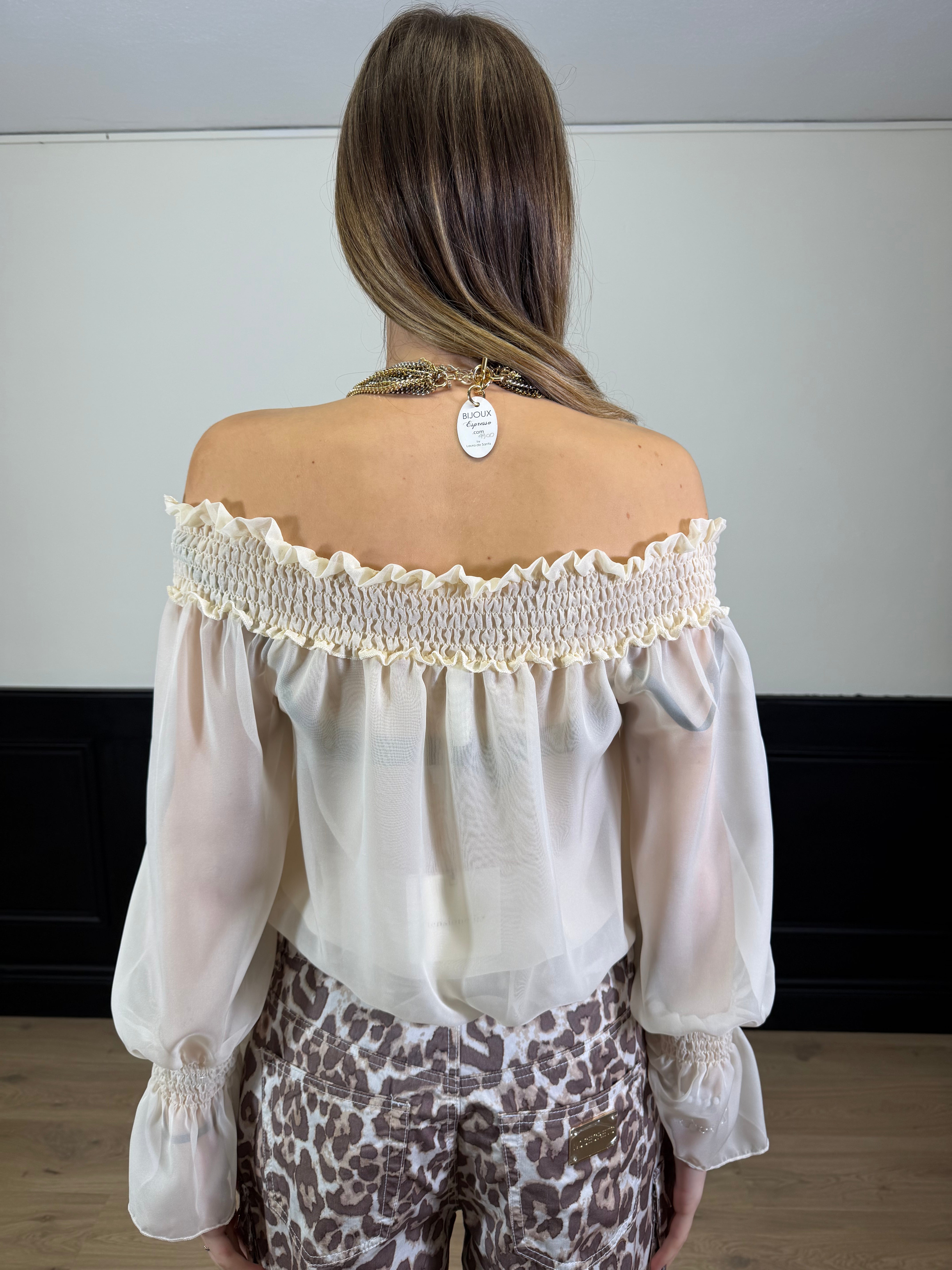 Blusa scollo a barca