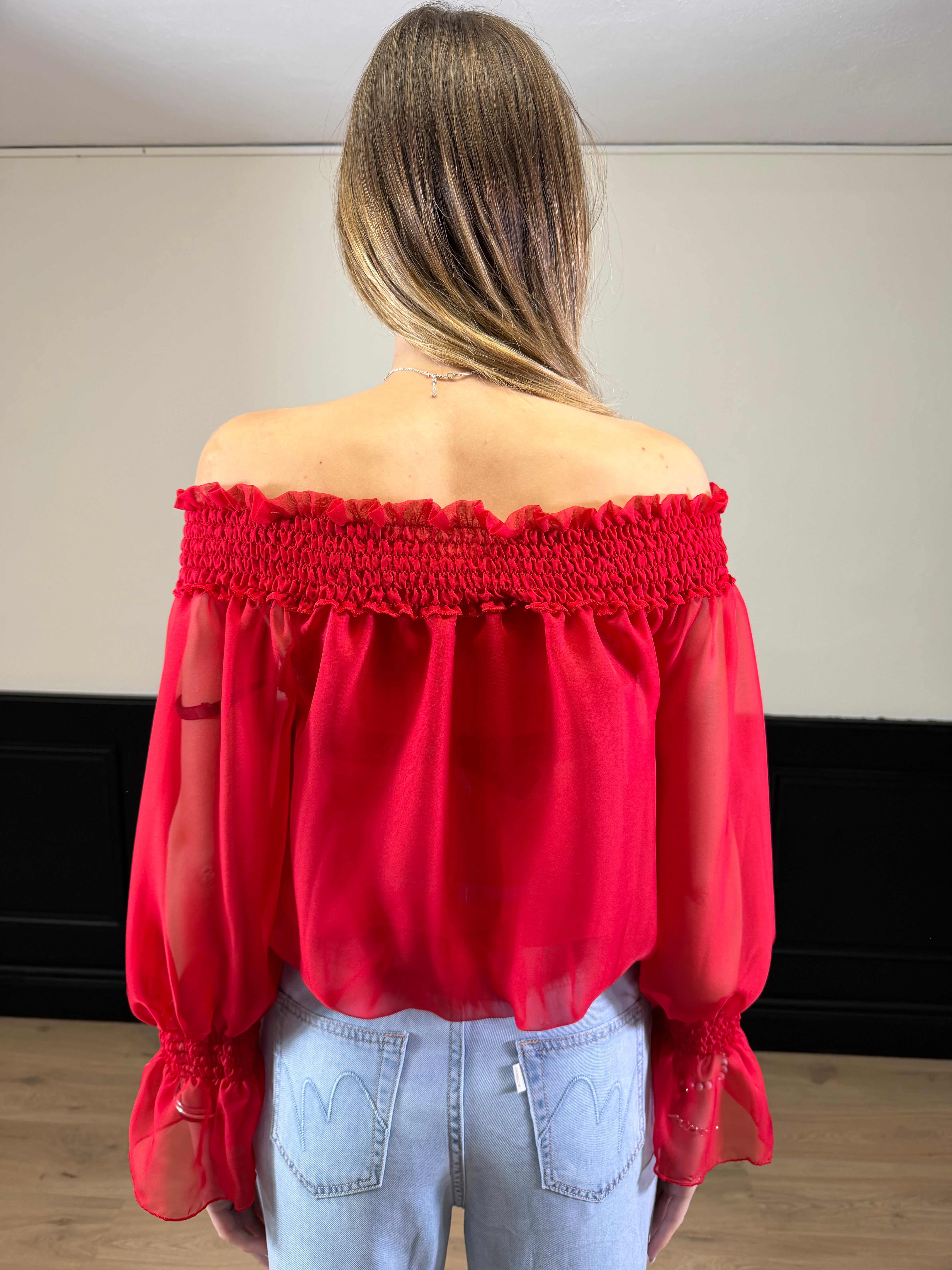 Blusa scollo a barca