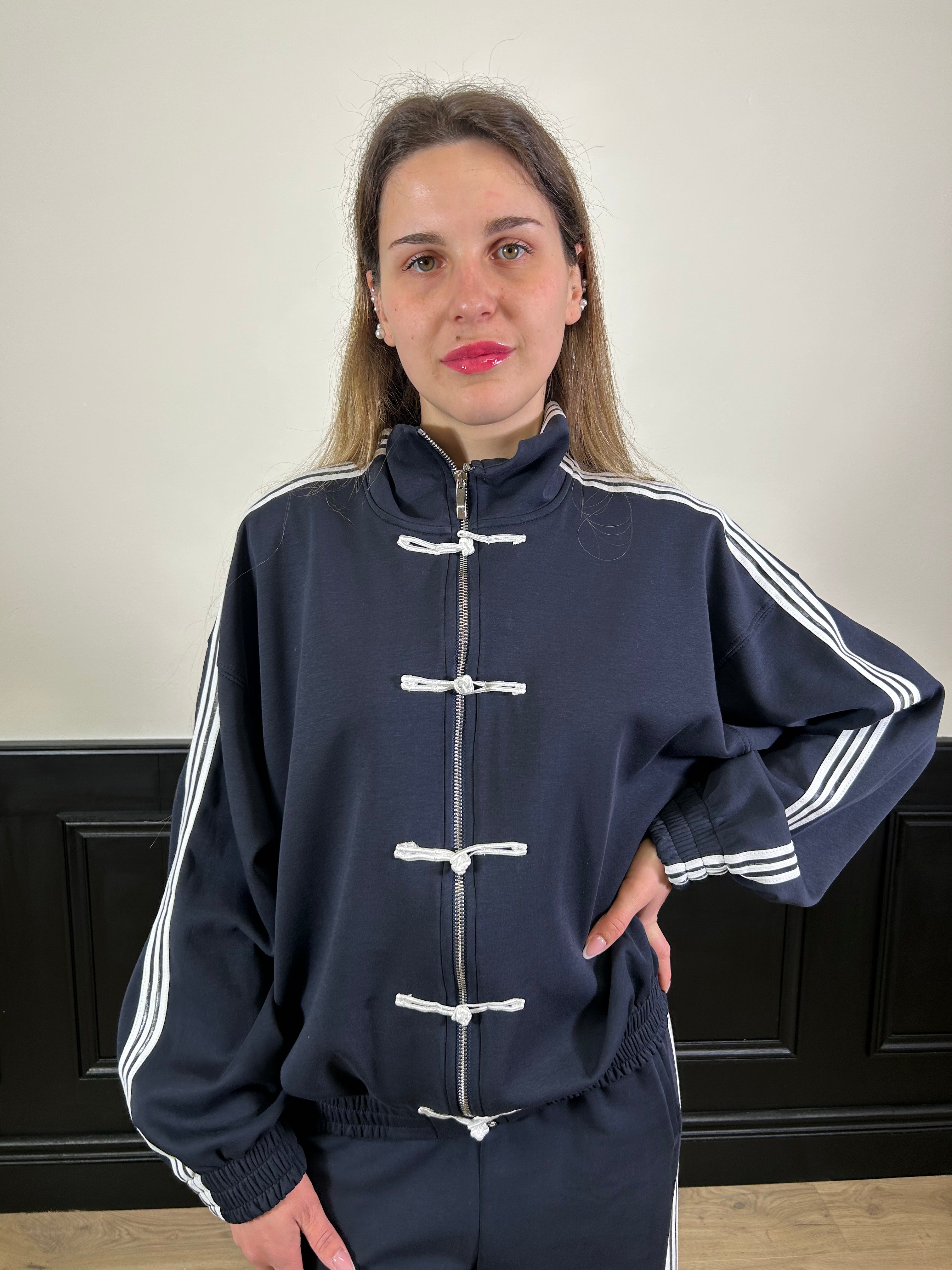 Tuta modello "Adidas" con alamari