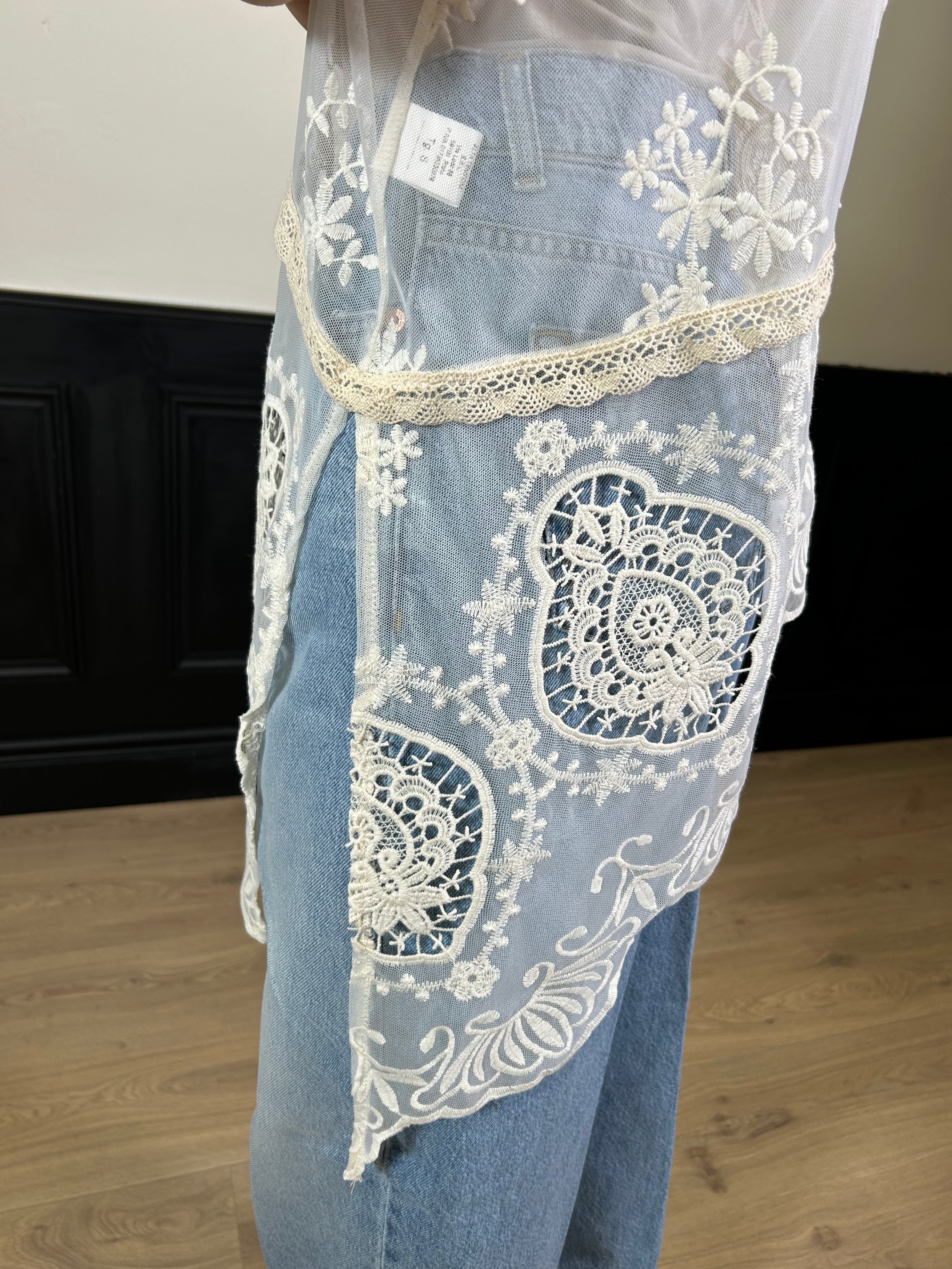 T-shirt in pizzo asimmetrica