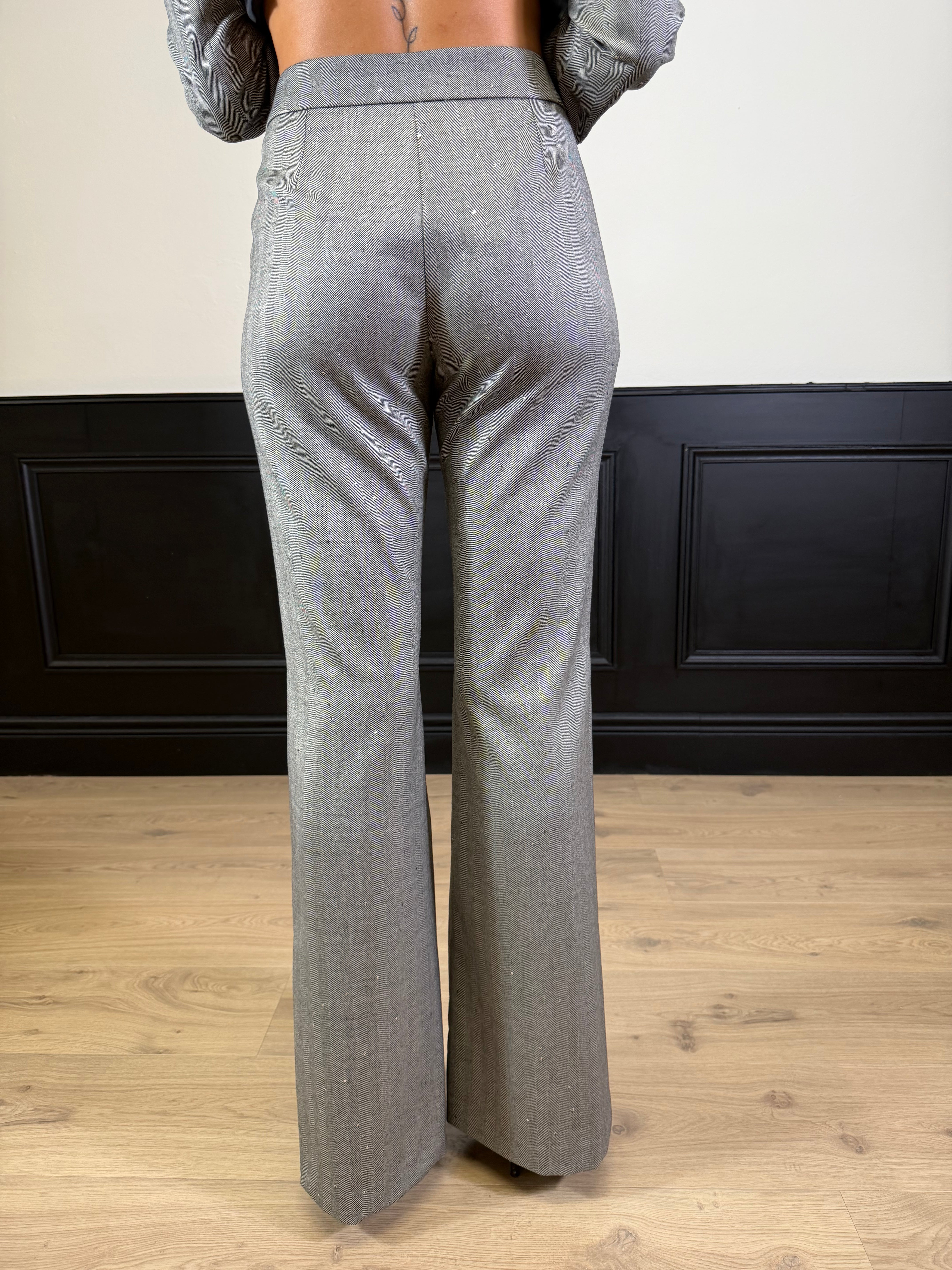 Pantalone scampanato fantasia spigata con paillettes