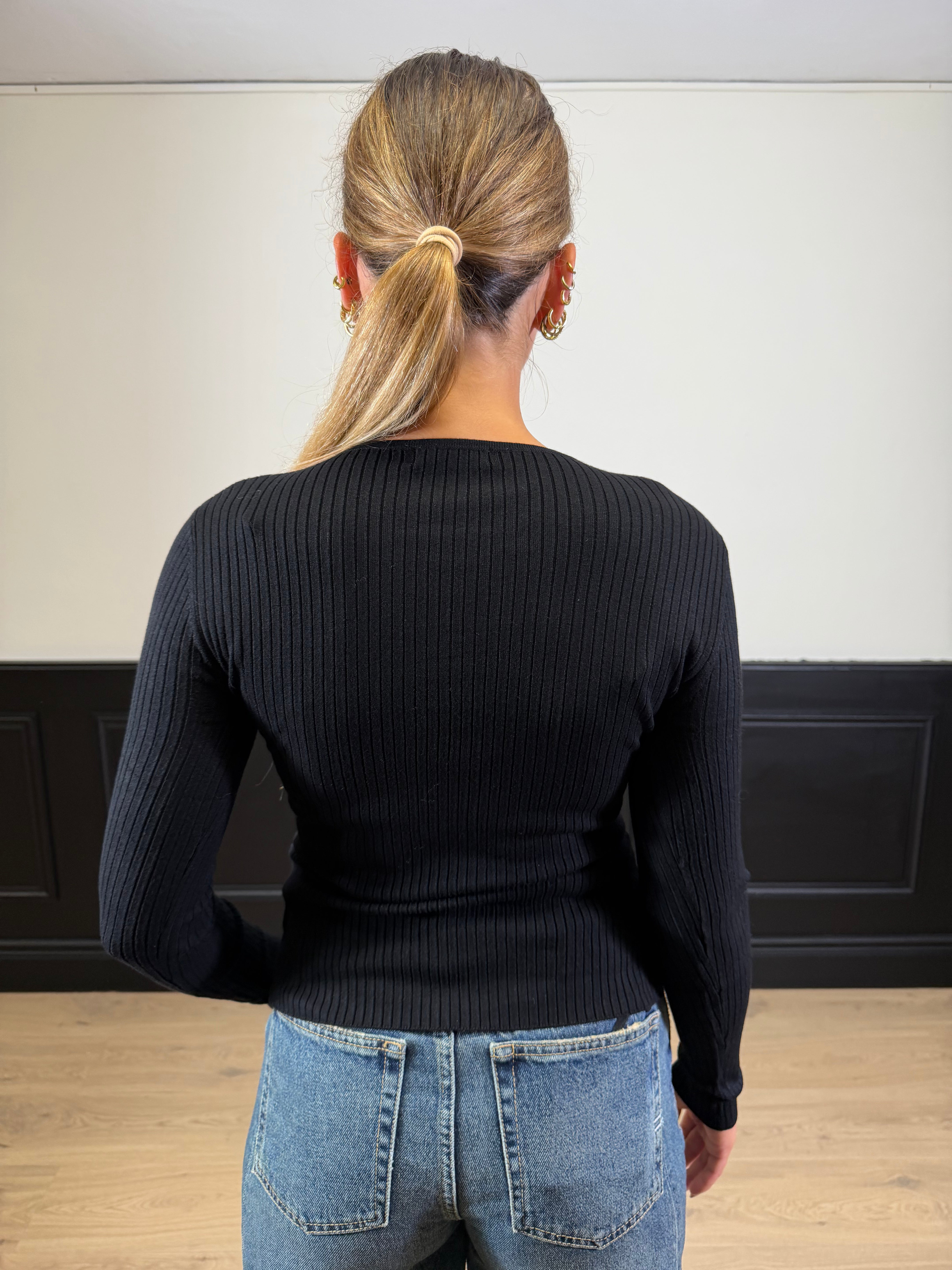 Maglia incrociata con catena