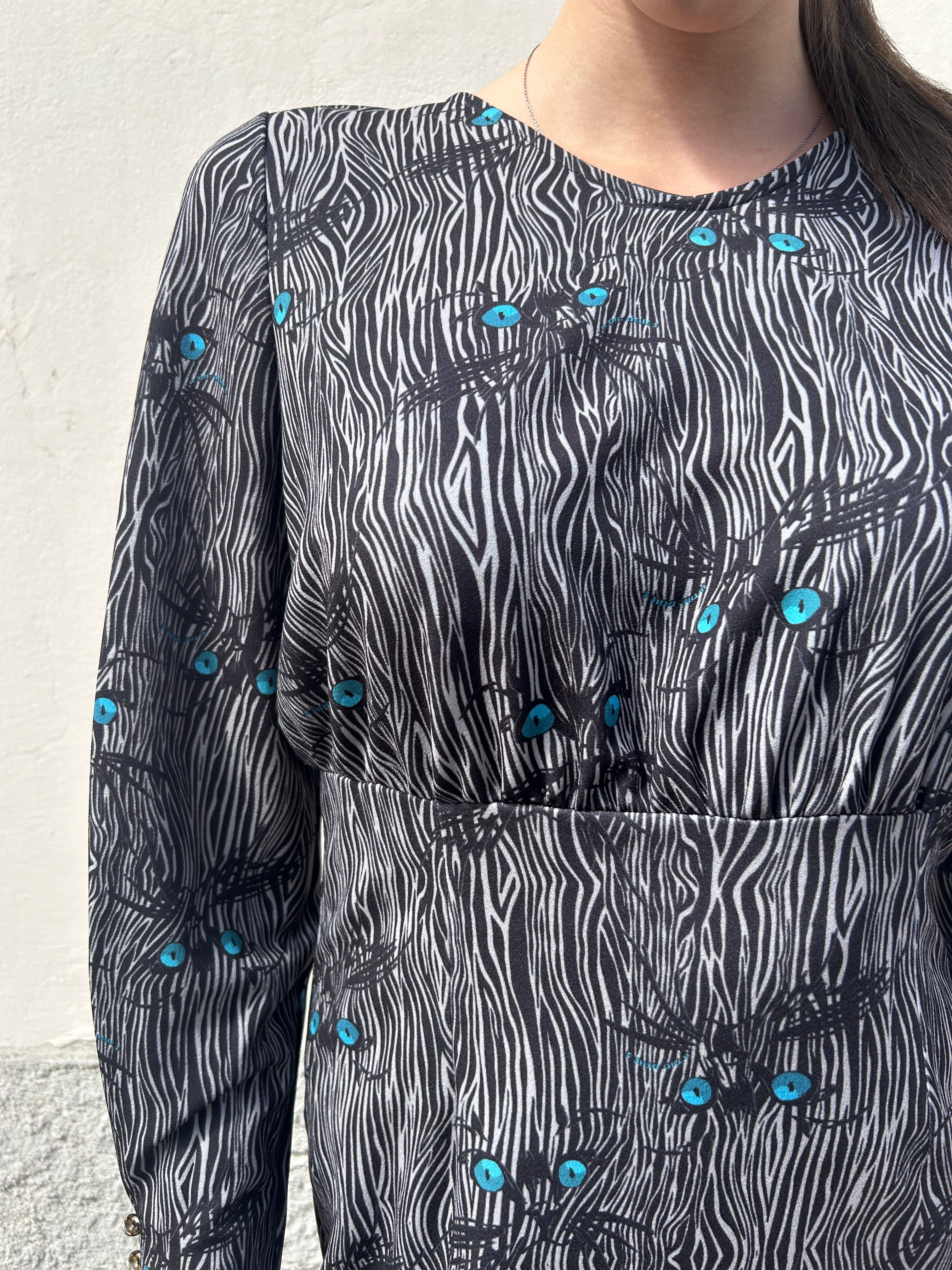 Abito corto fantasia zebrata con occhi di gatto