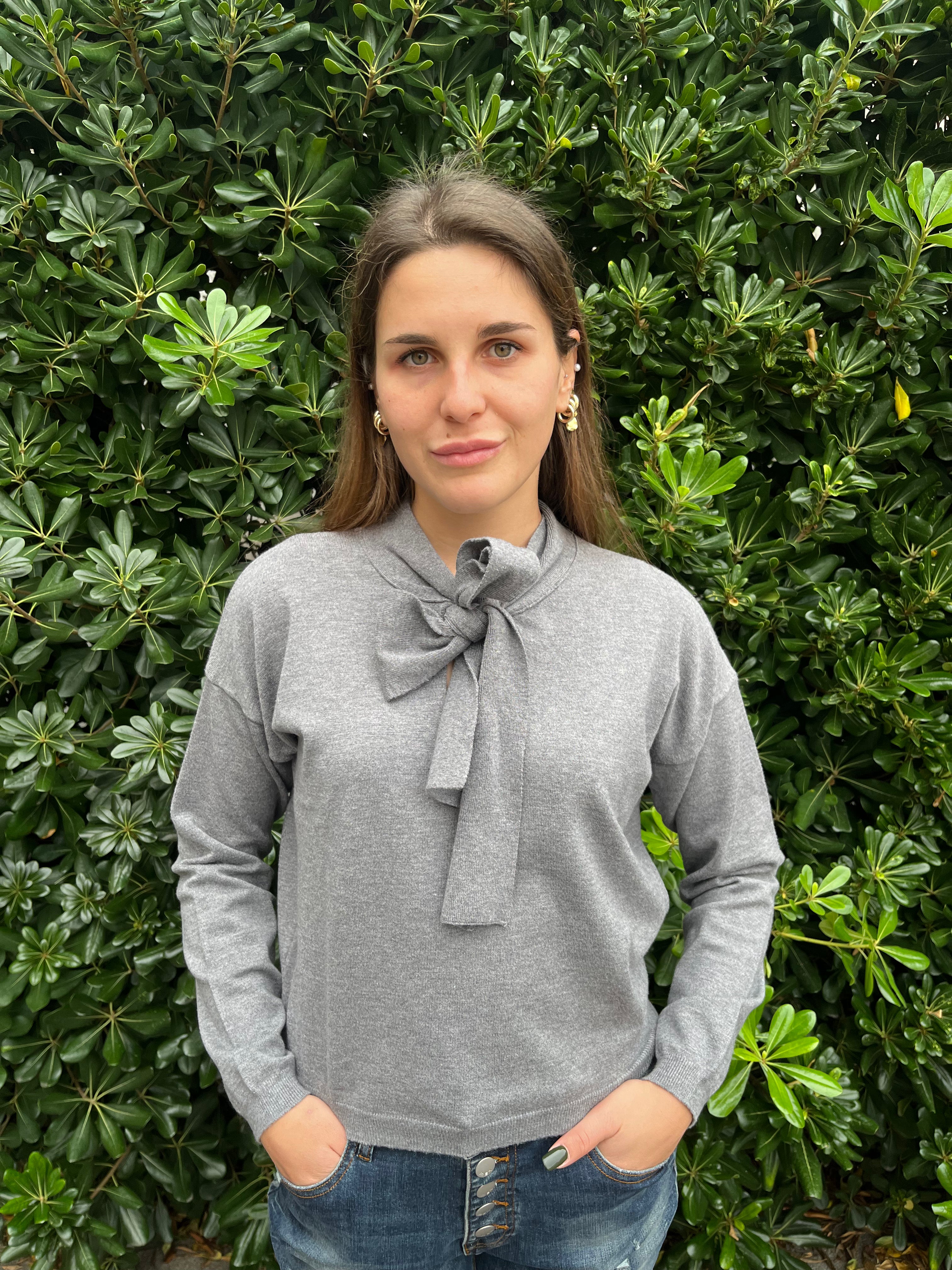 Maglia con fiocco frontale