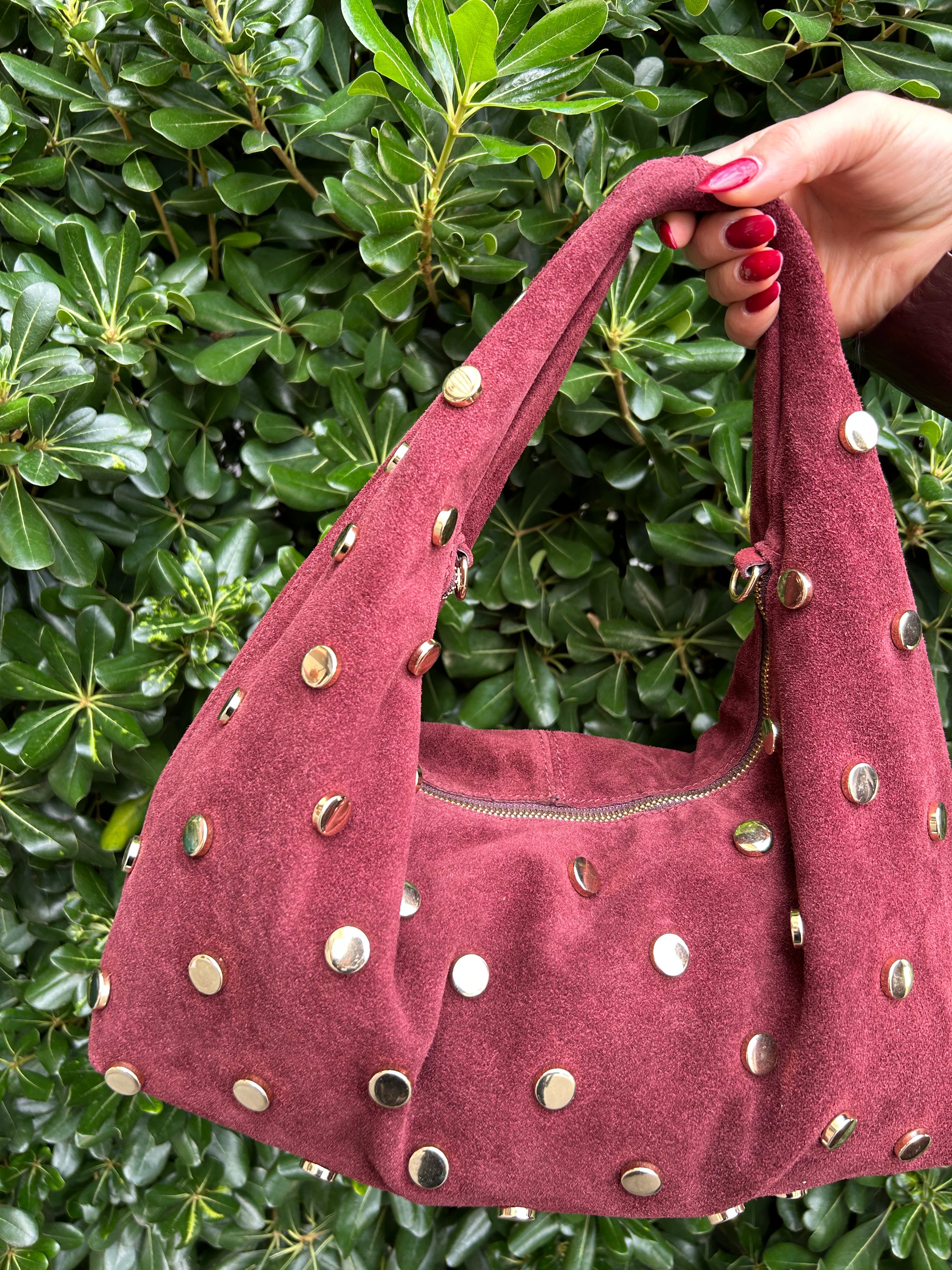 Pochette a mano con borchie