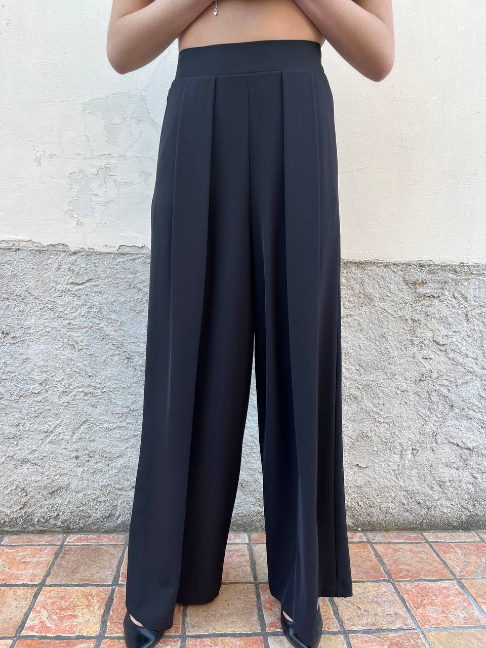 Pantalone palazzo con pence