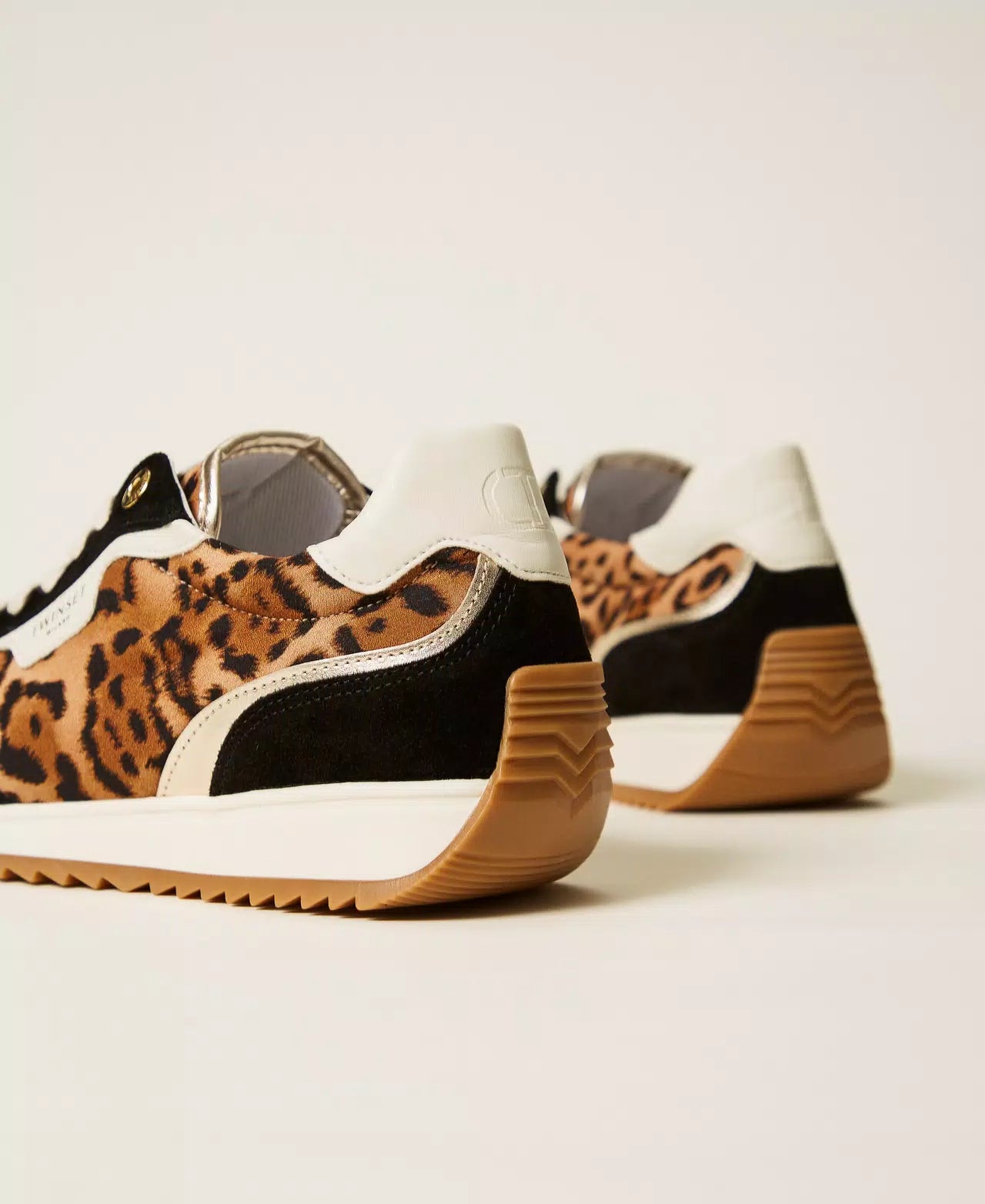 Sneakers in pelle con dettagli animalier