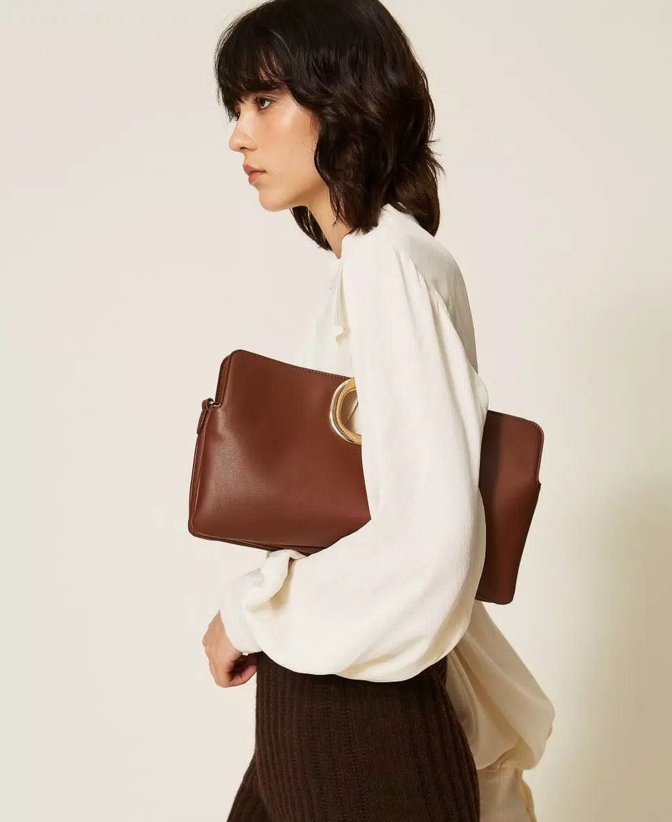 Borsa clutch con manico legato
