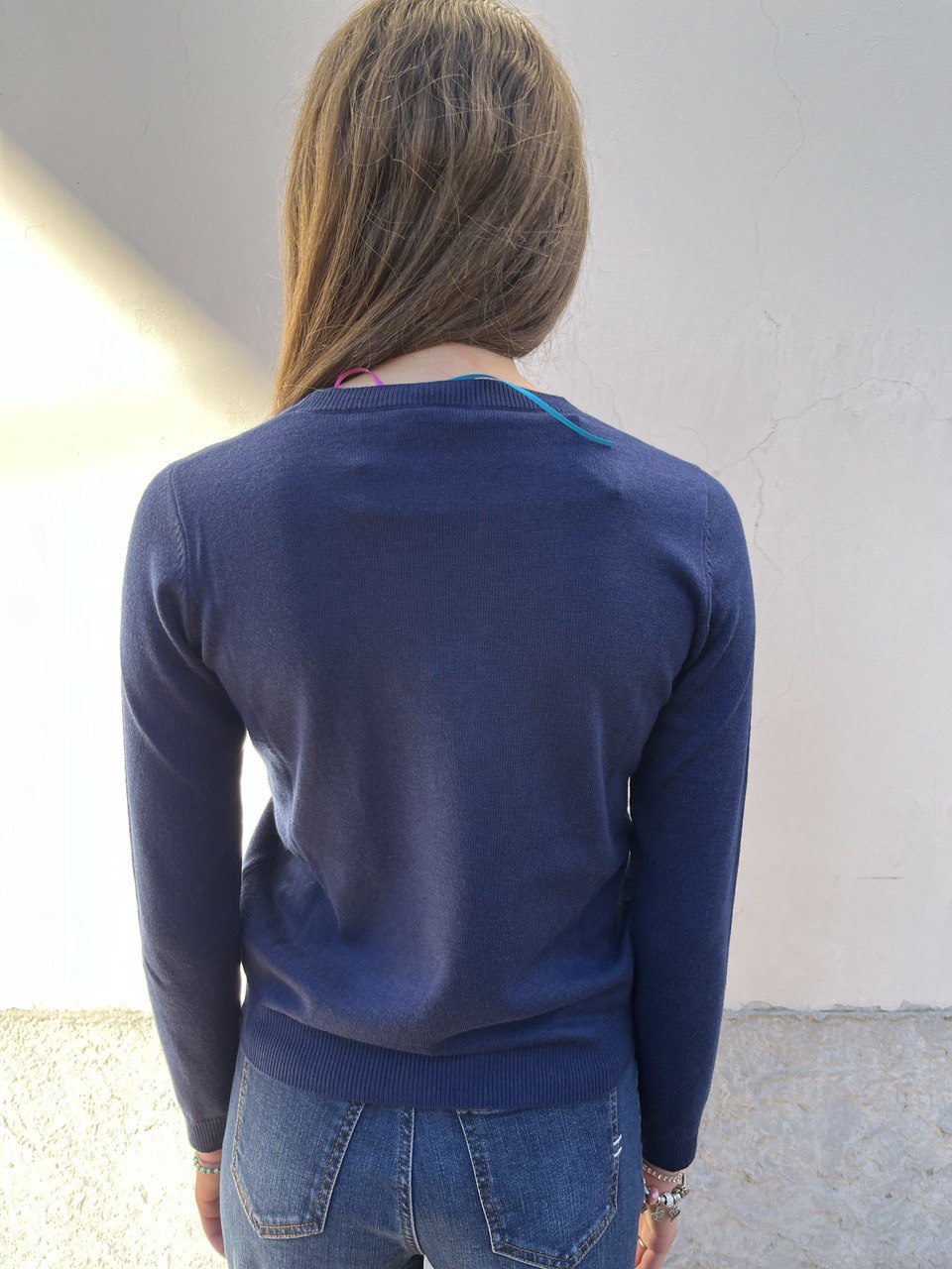 Pull con ricamo braccio di ferro