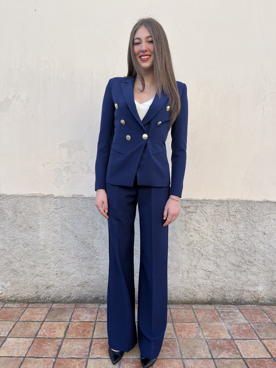 Tailleur con giacca balmain e pantalone palazzo