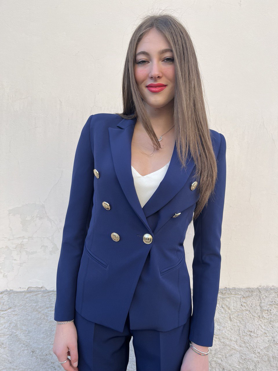 Tailleur con giacca balmain e pantalone palazzo