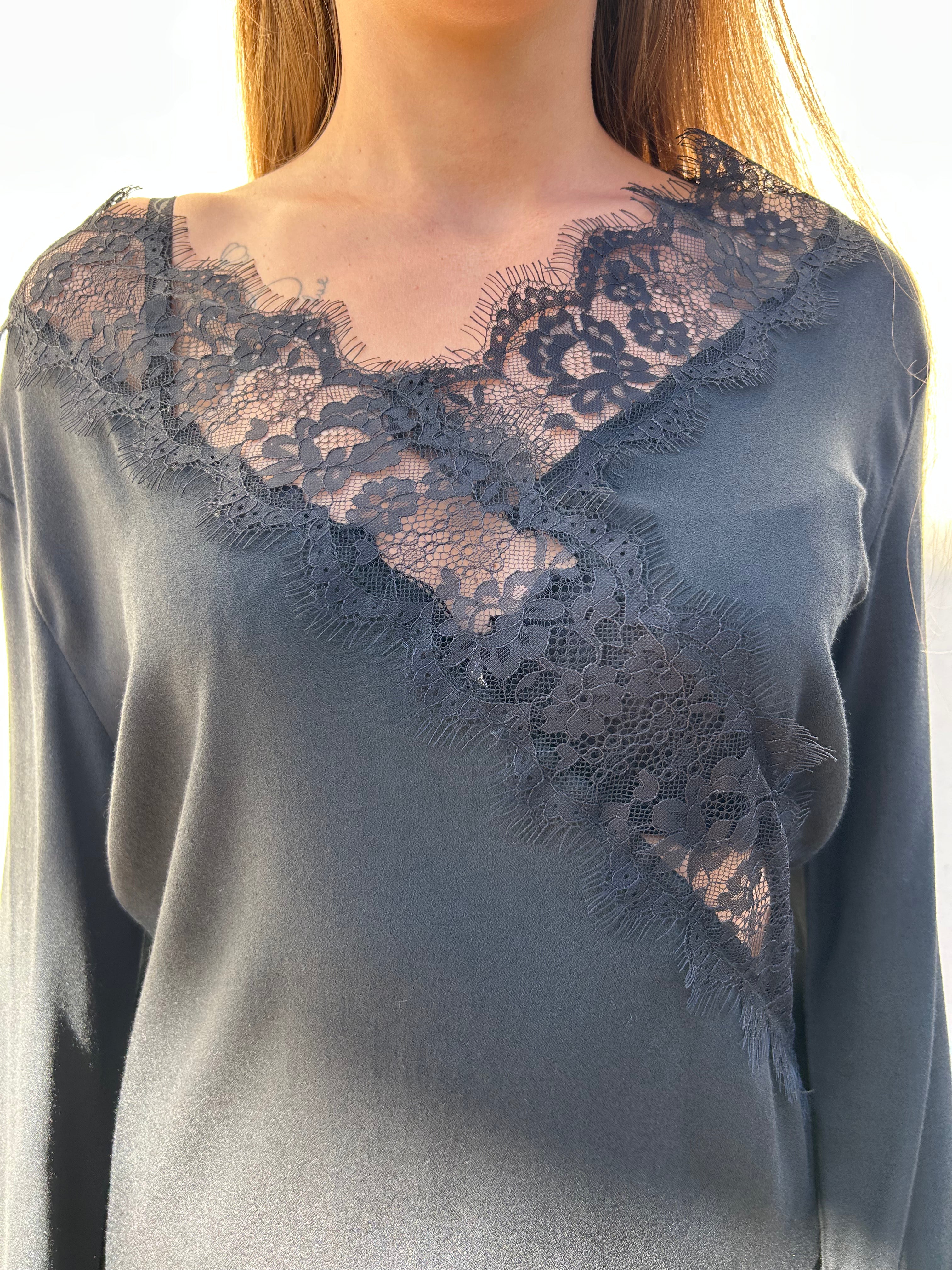 Maglia asimmetrica con pizzo