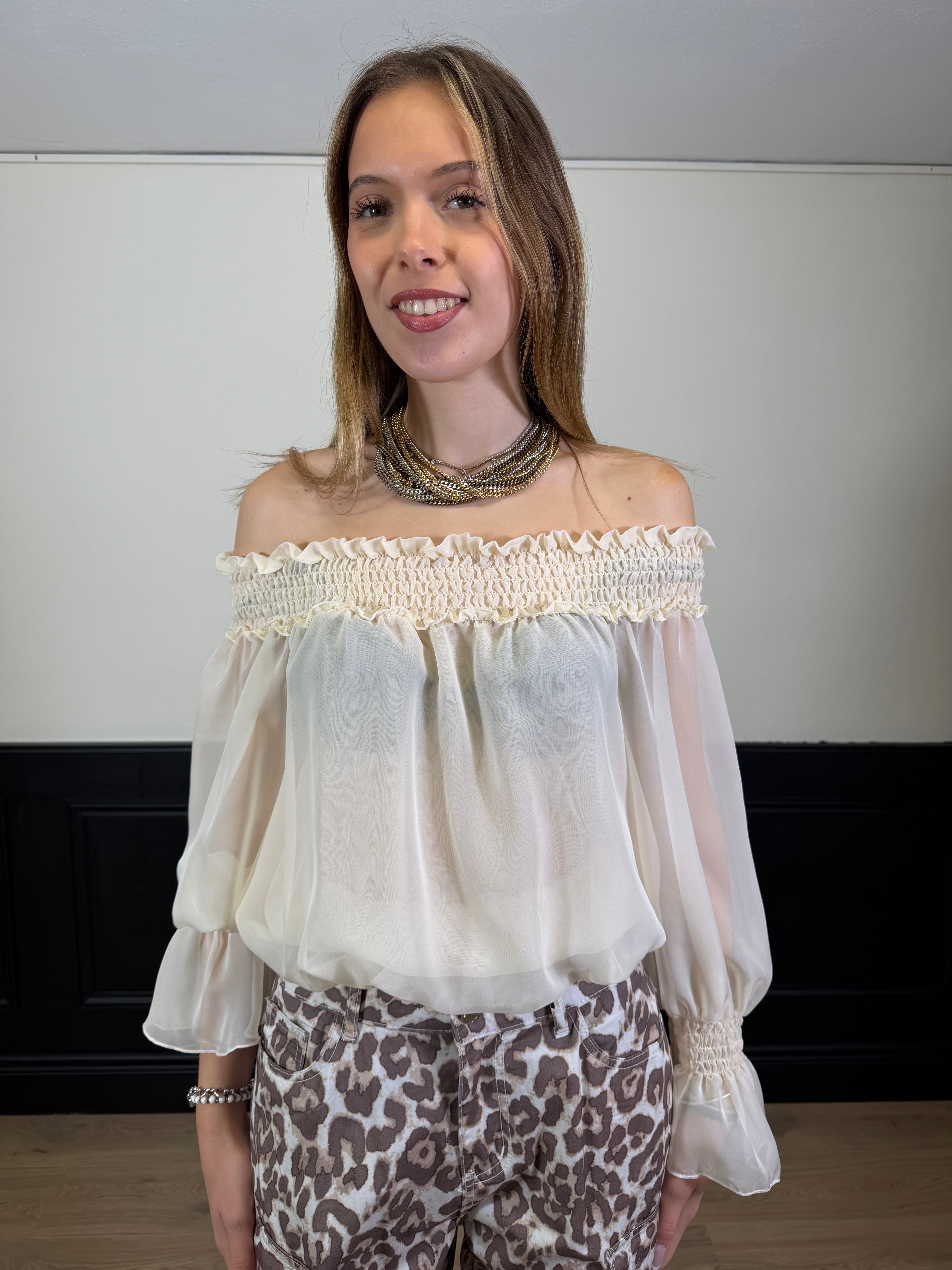 Blusa scollo a barca