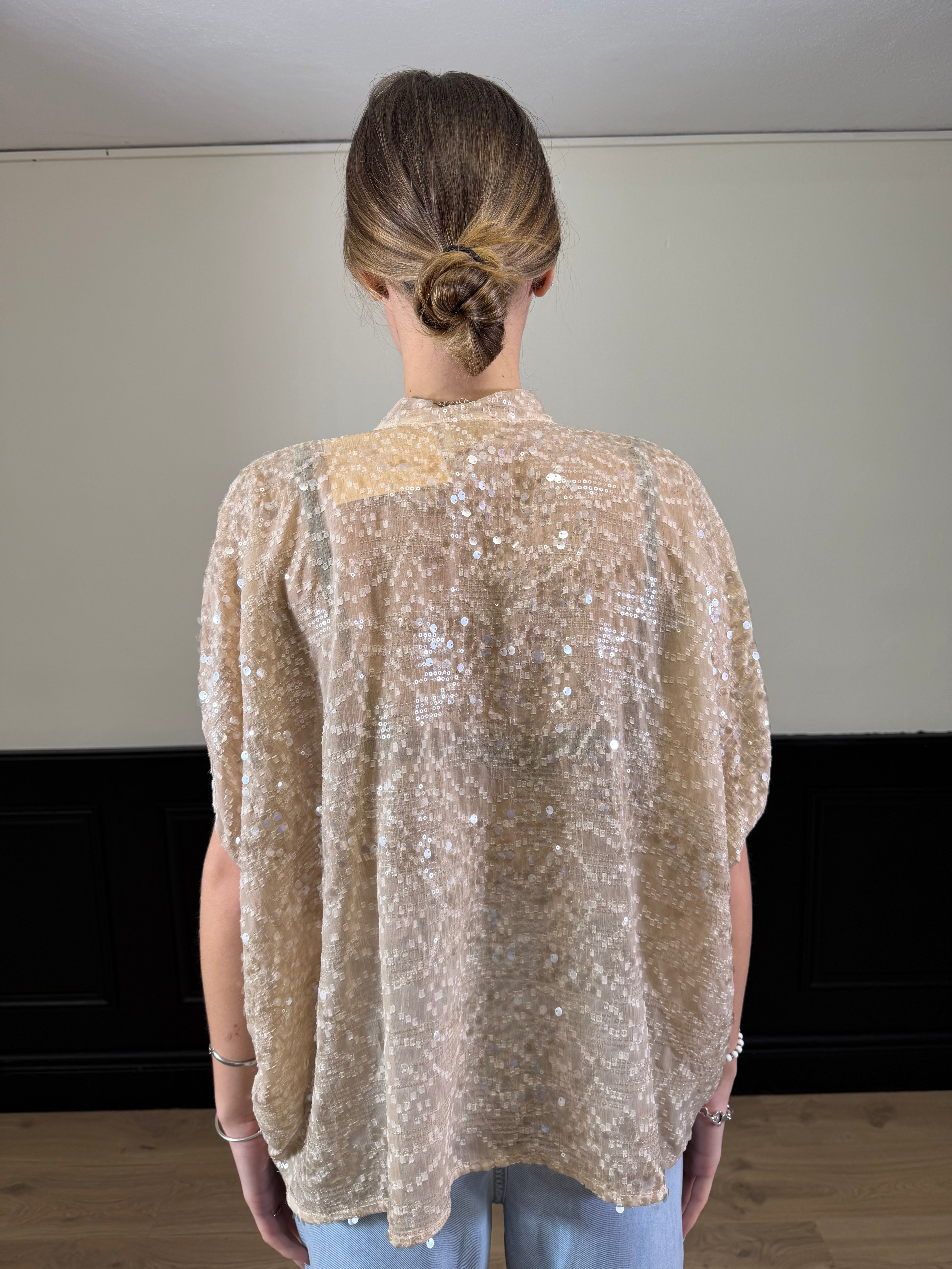Blusa ampia dettaglio paillettes