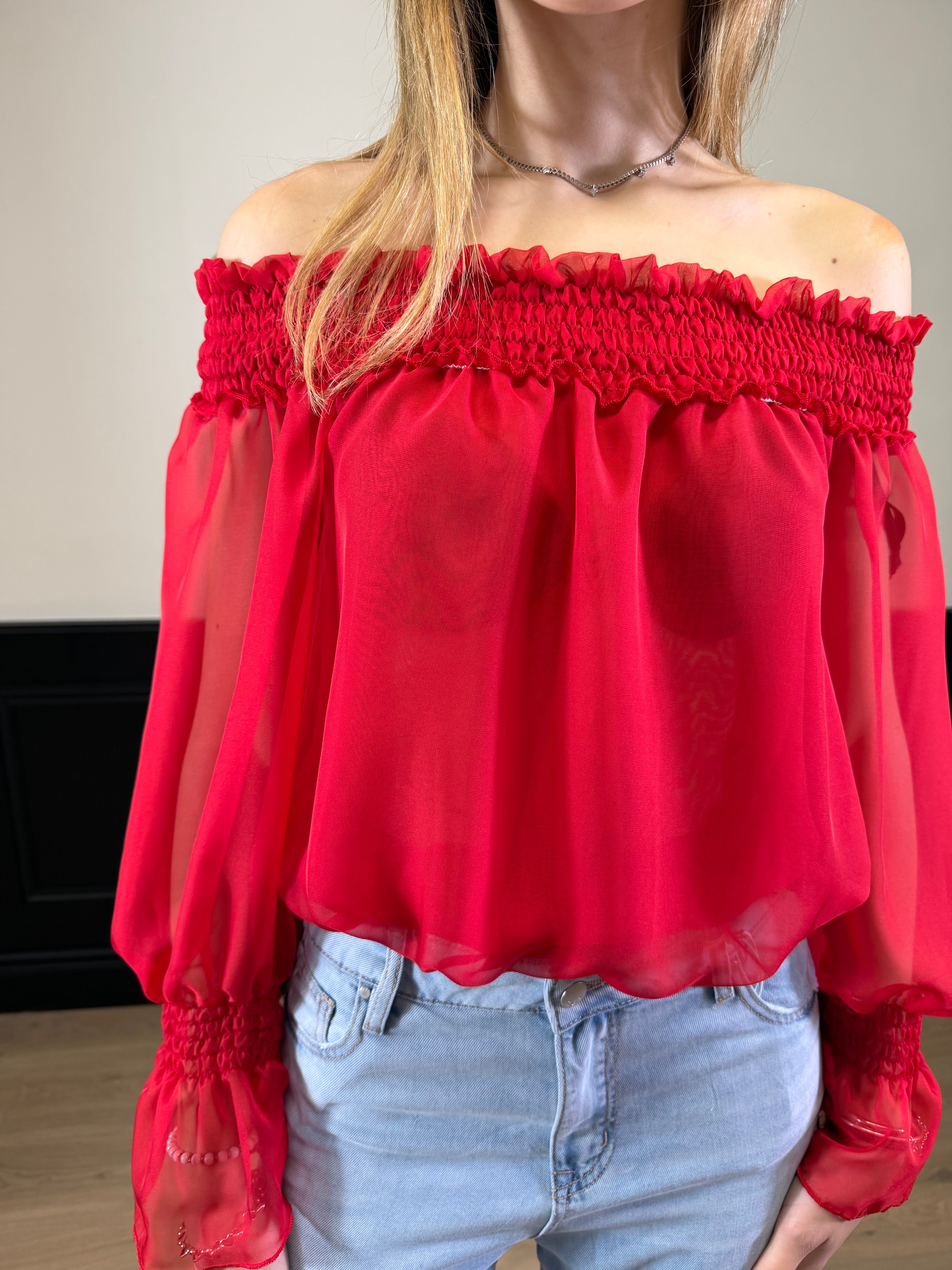 Blusa scollo a barca