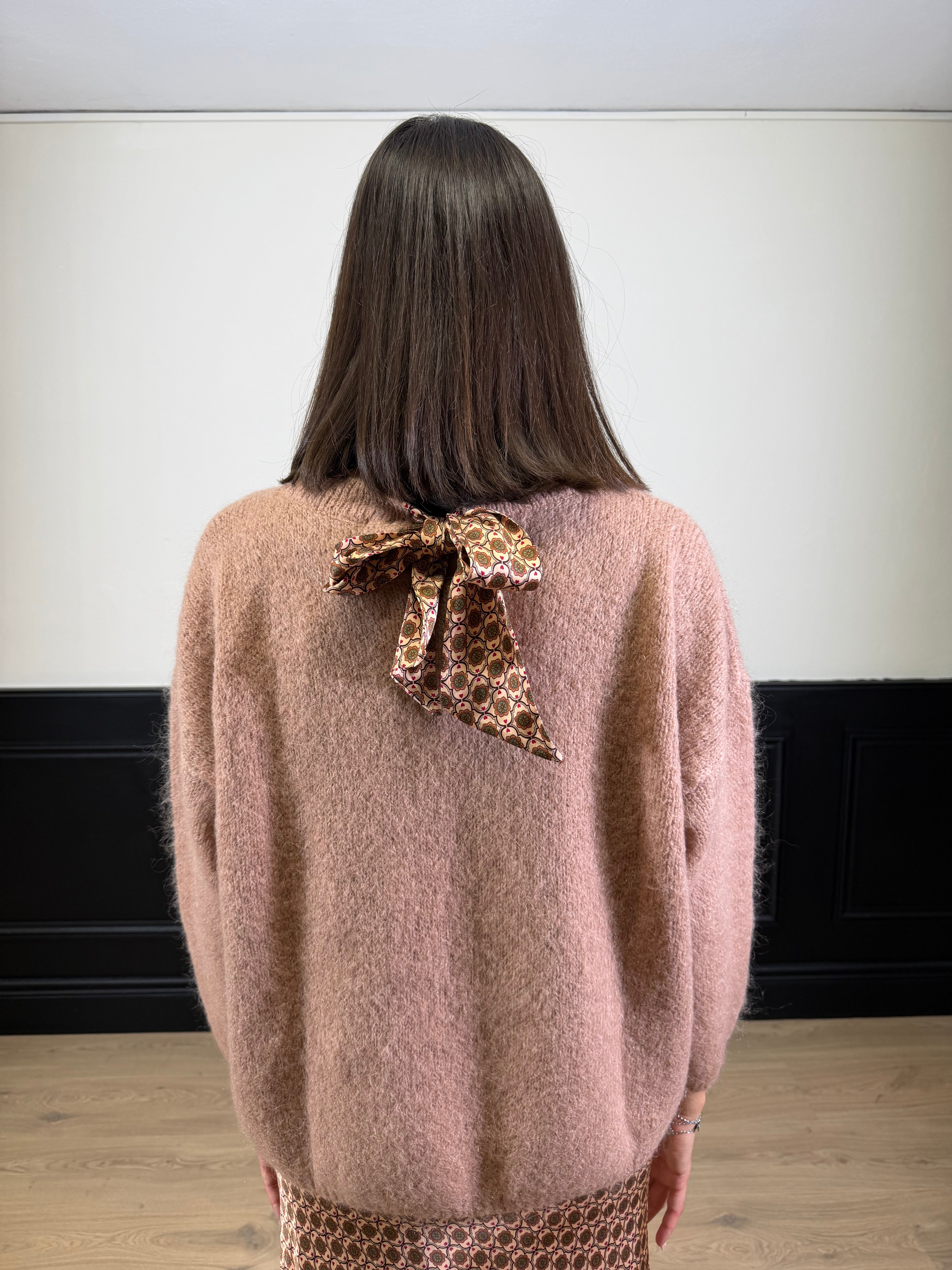 Pull in mohair con fiocco fantasia