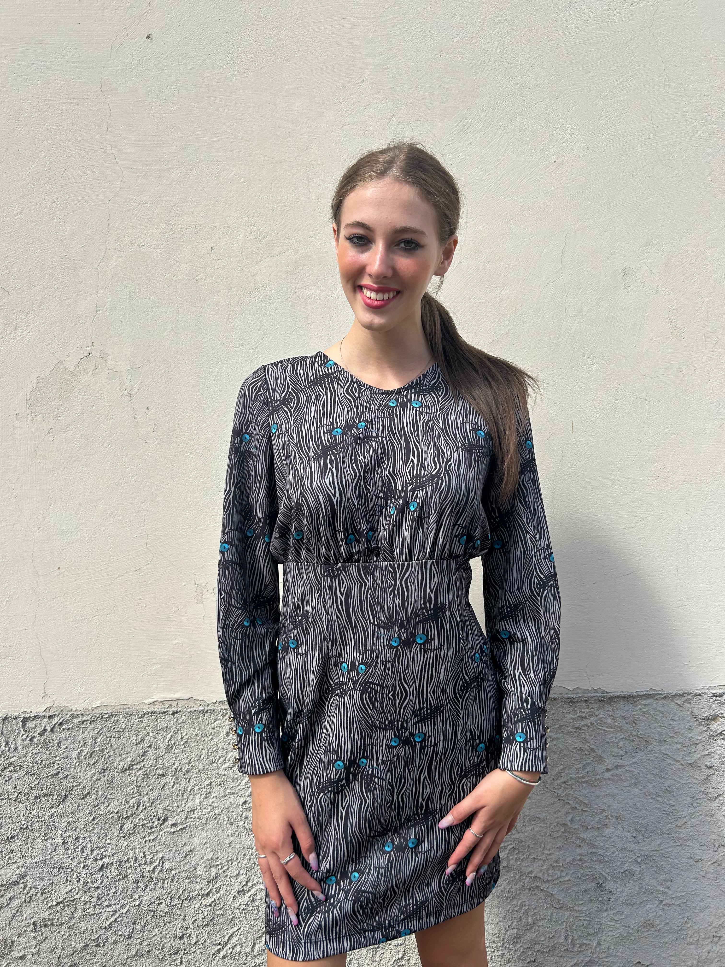 Abito corto fantasia zebrata con occhi di gatto