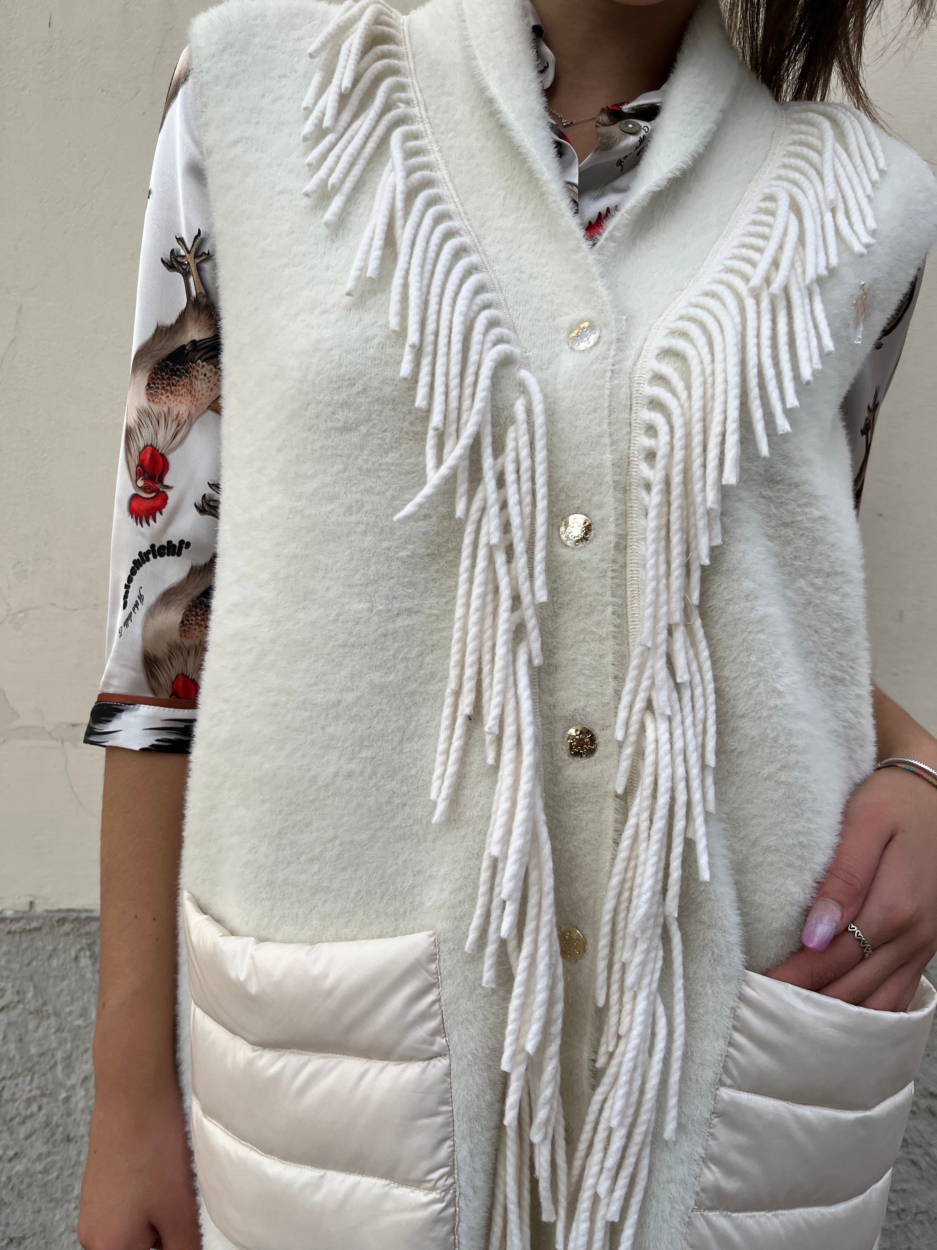 Piumino gilet in maglia con frange