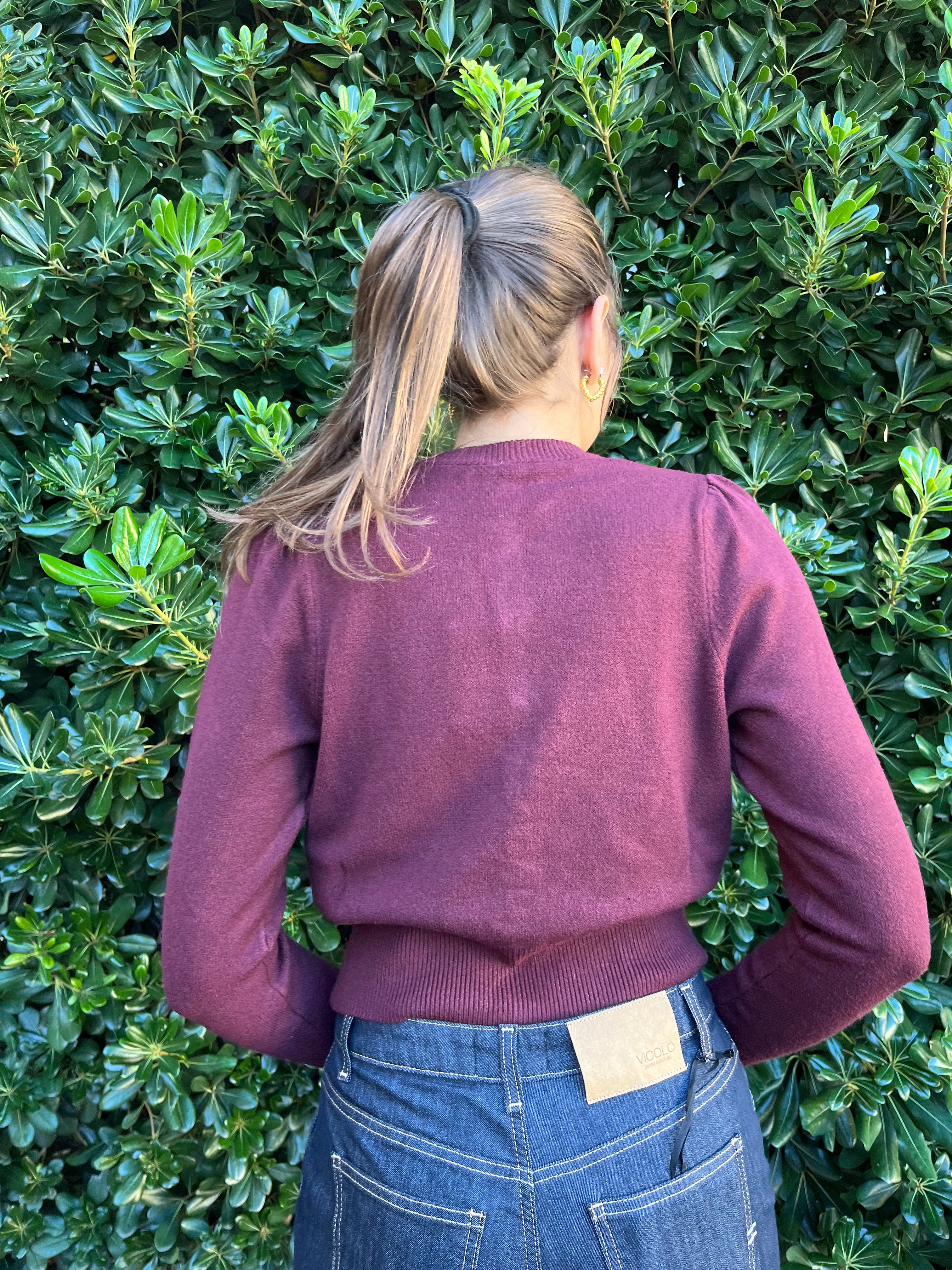 Maglia con bottoncini gioiello