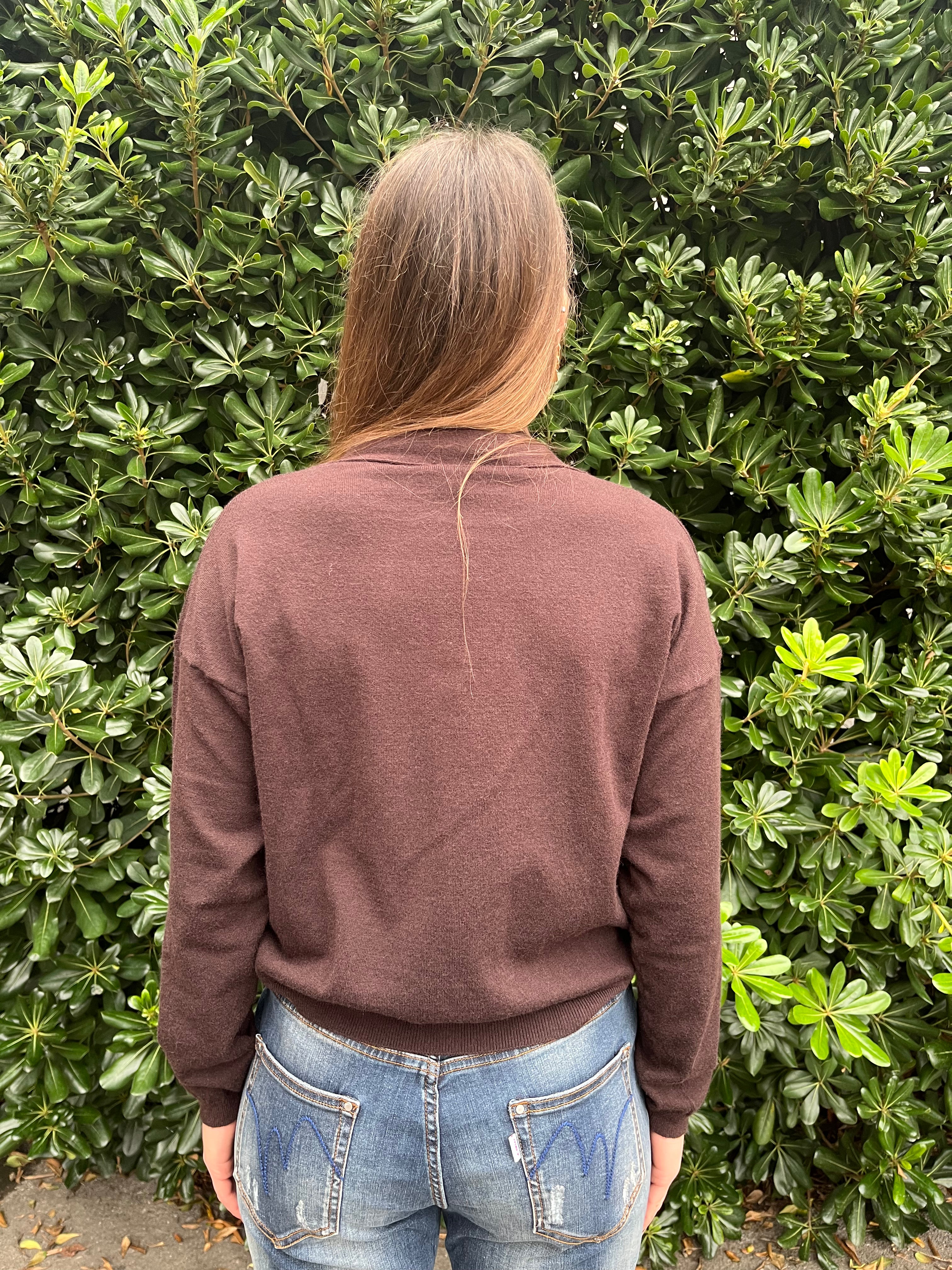 Maglia con fiocco frontale