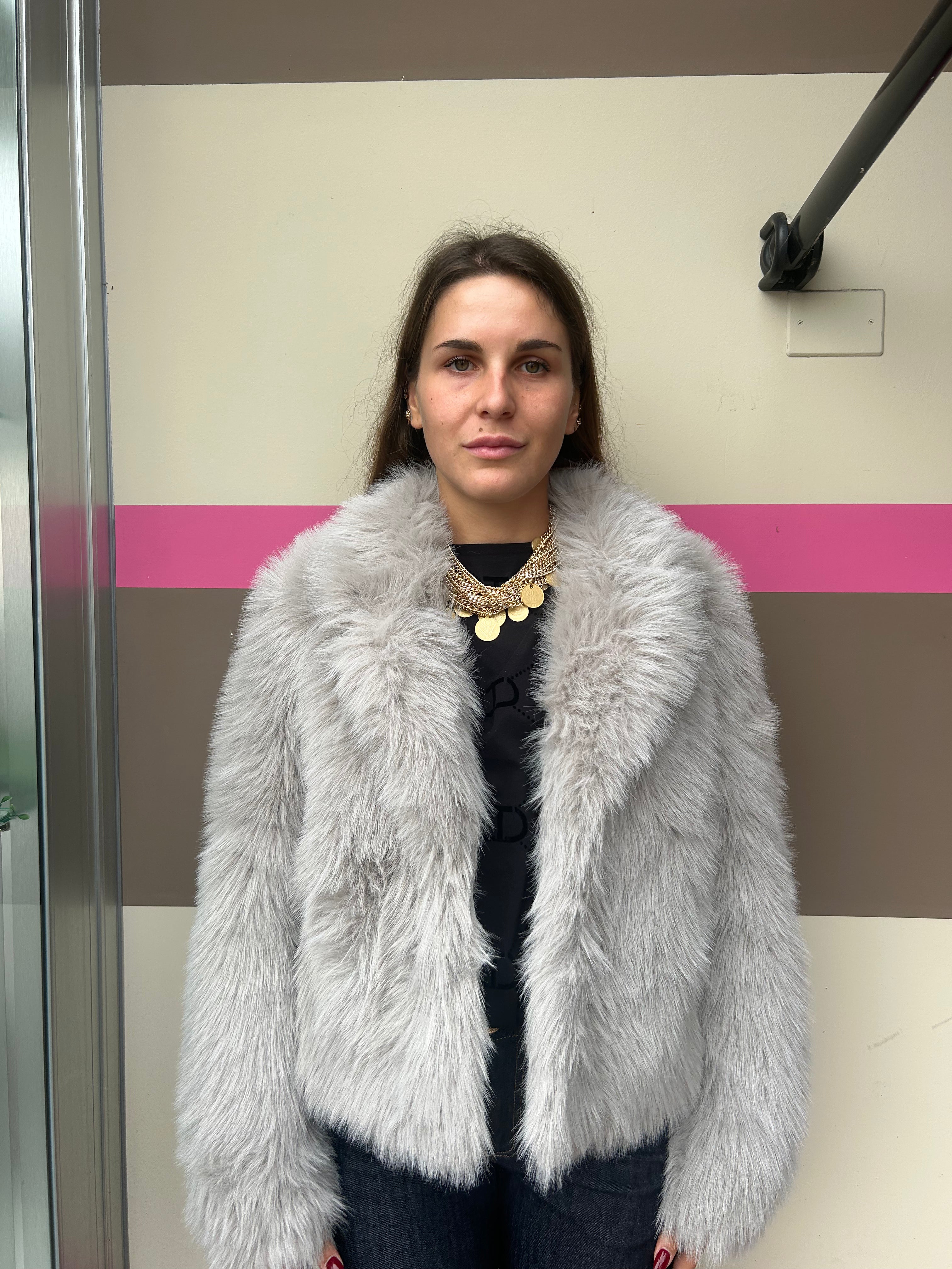 Ecopelliccia con revers più tasche