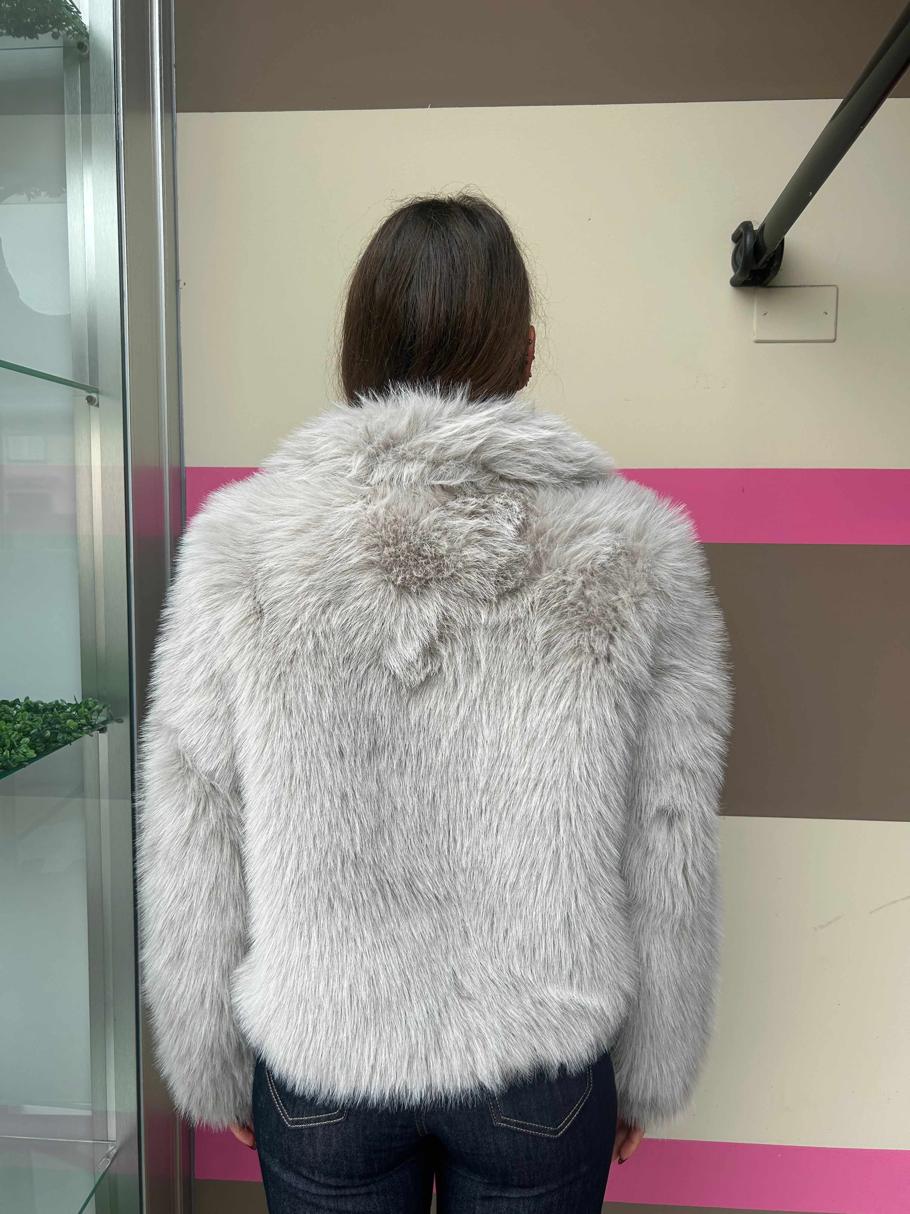 Ecopelliccia con revers più tasche
