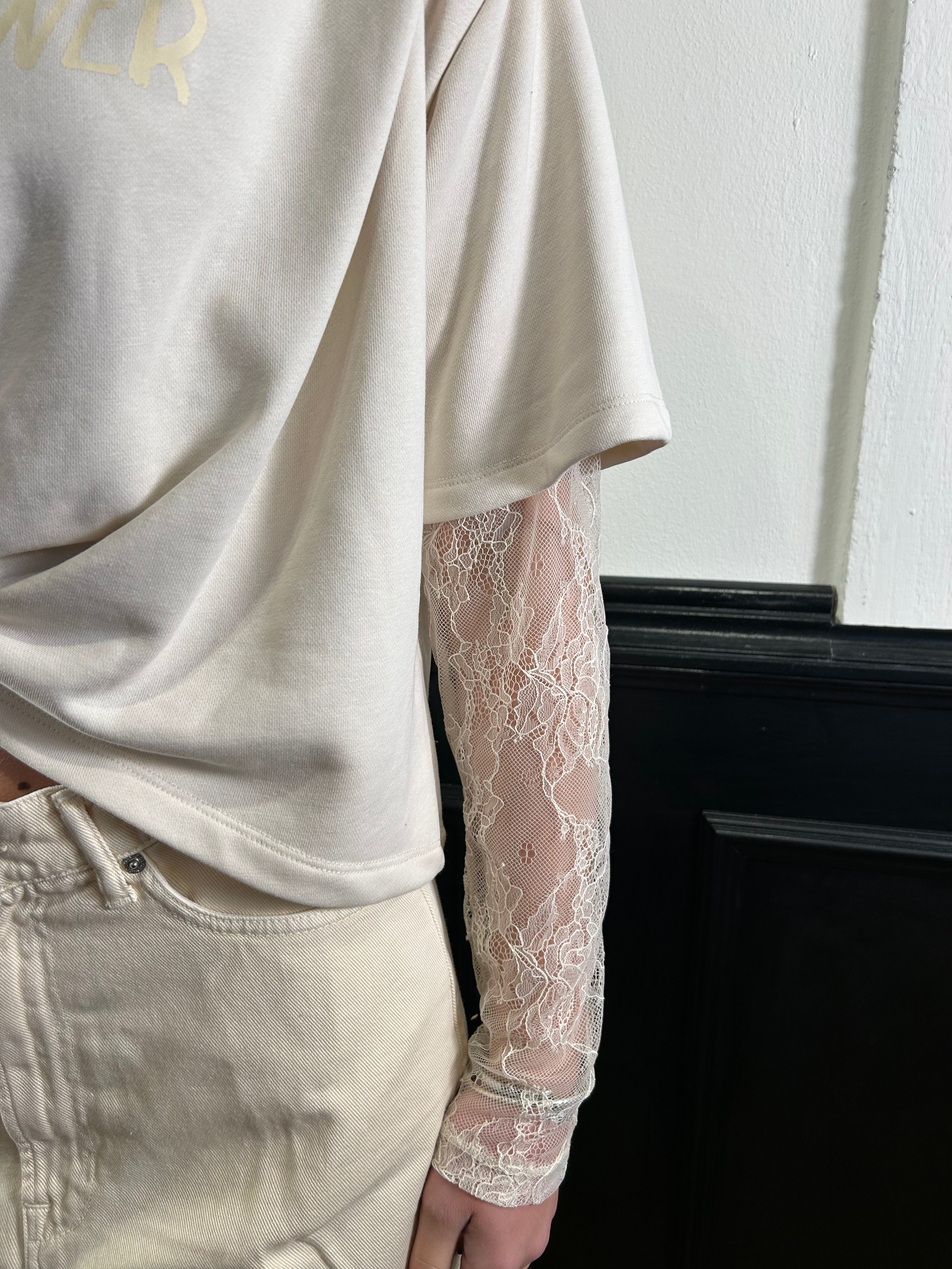 Felpa con maniche in pizzo e nodo panna