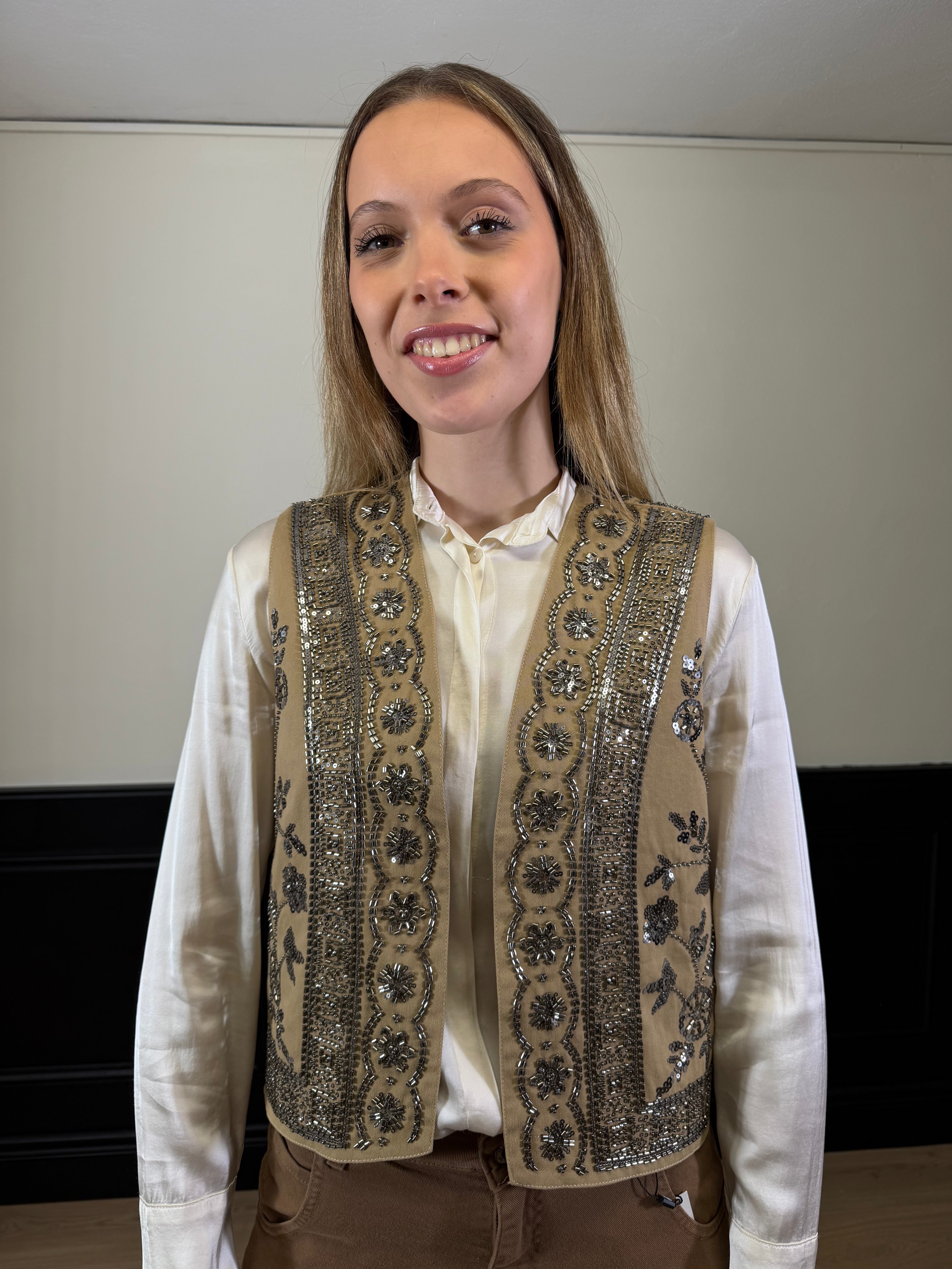 Gilet corto con paillettes