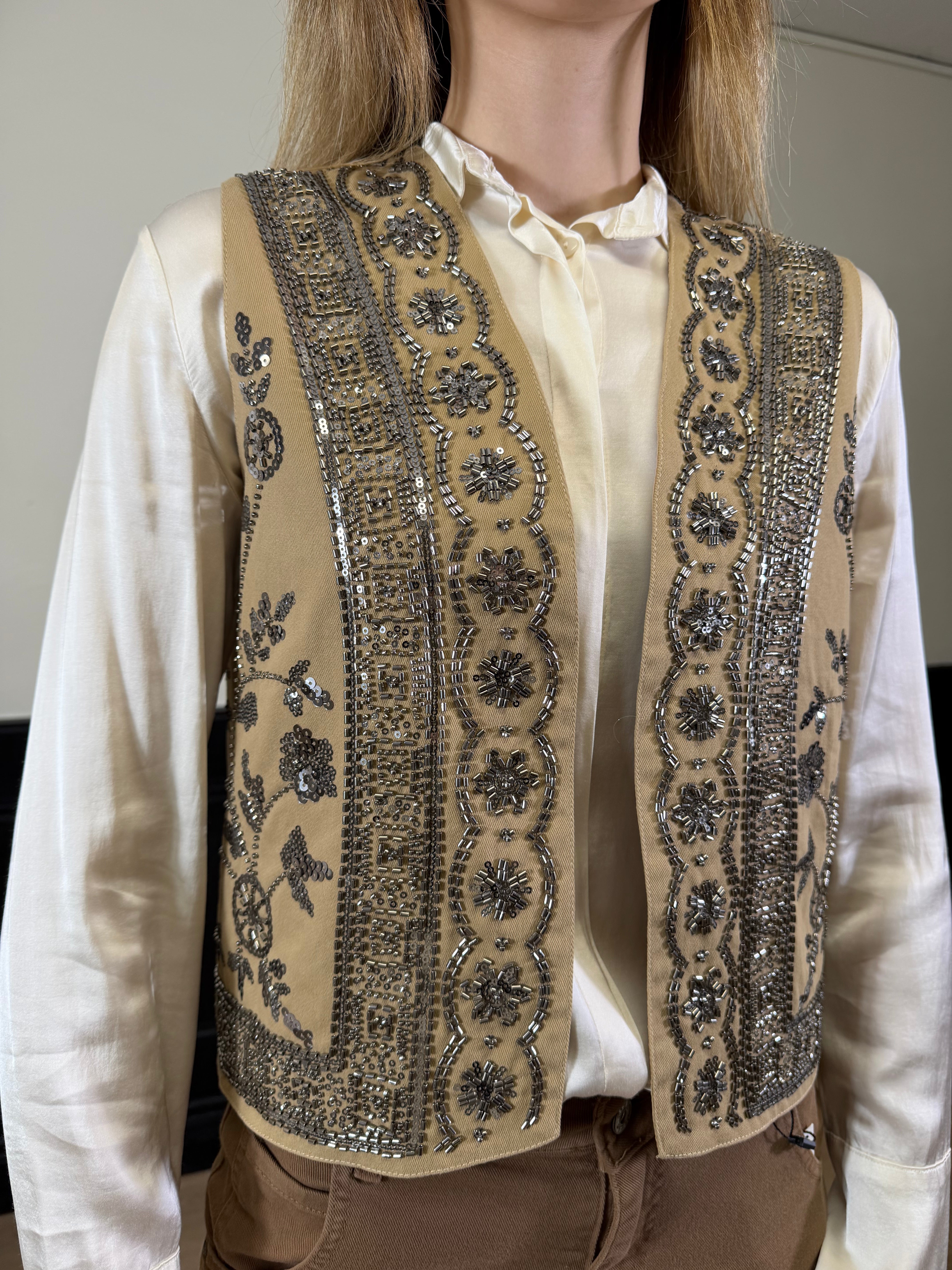 Gilet corto con paillettes