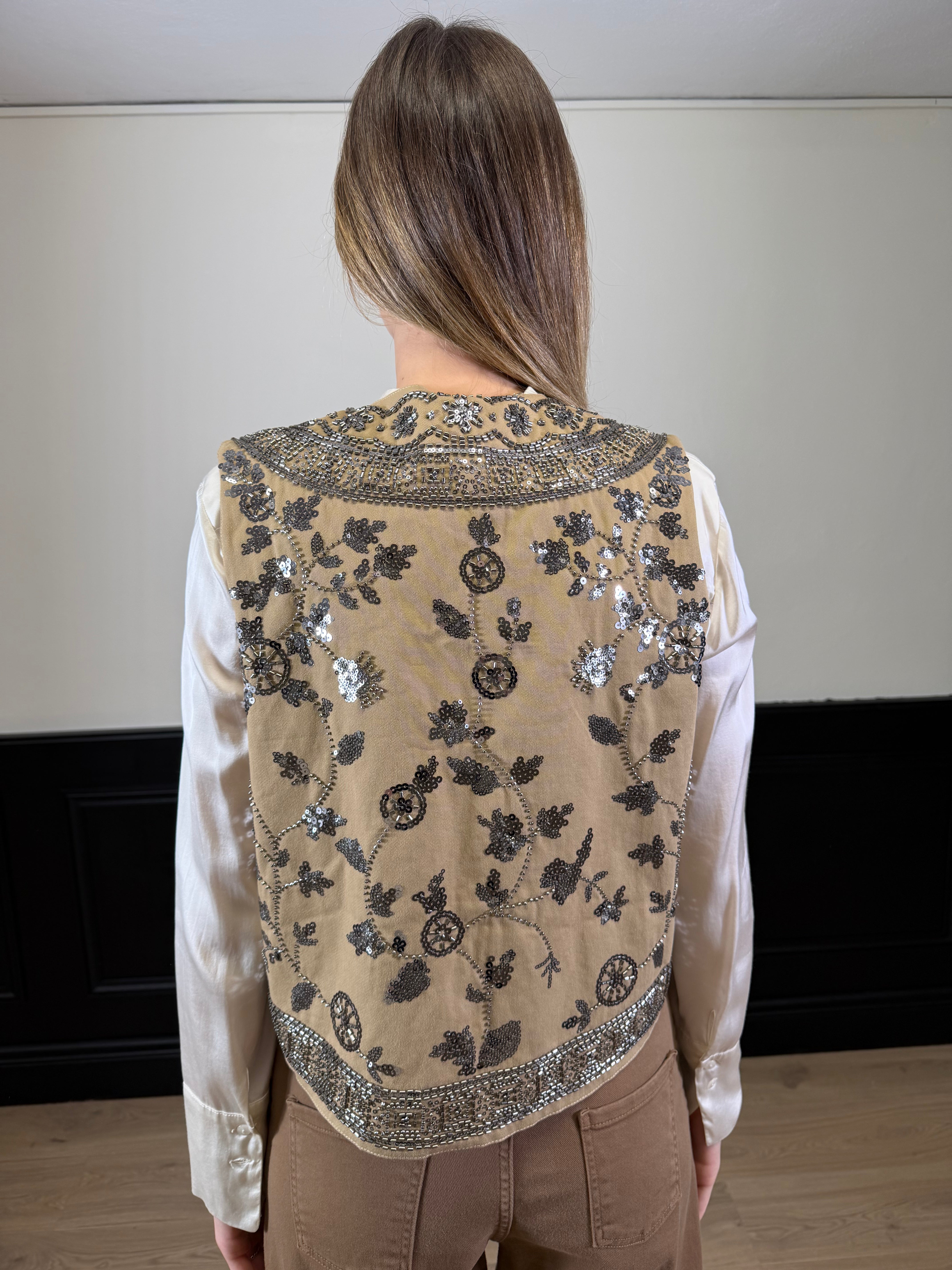 Gilet corto con paillettes