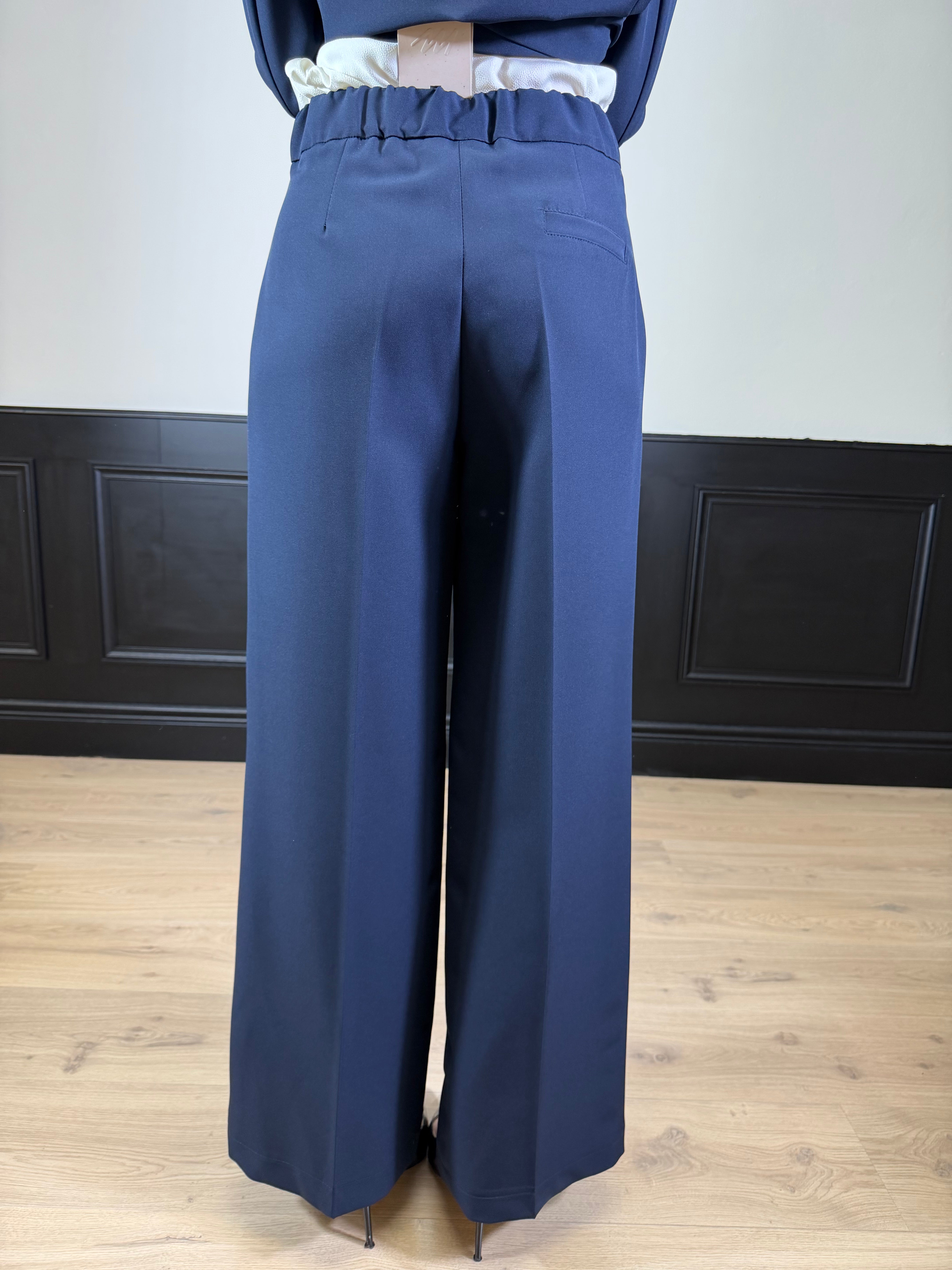 Pantalone palazzo con pence