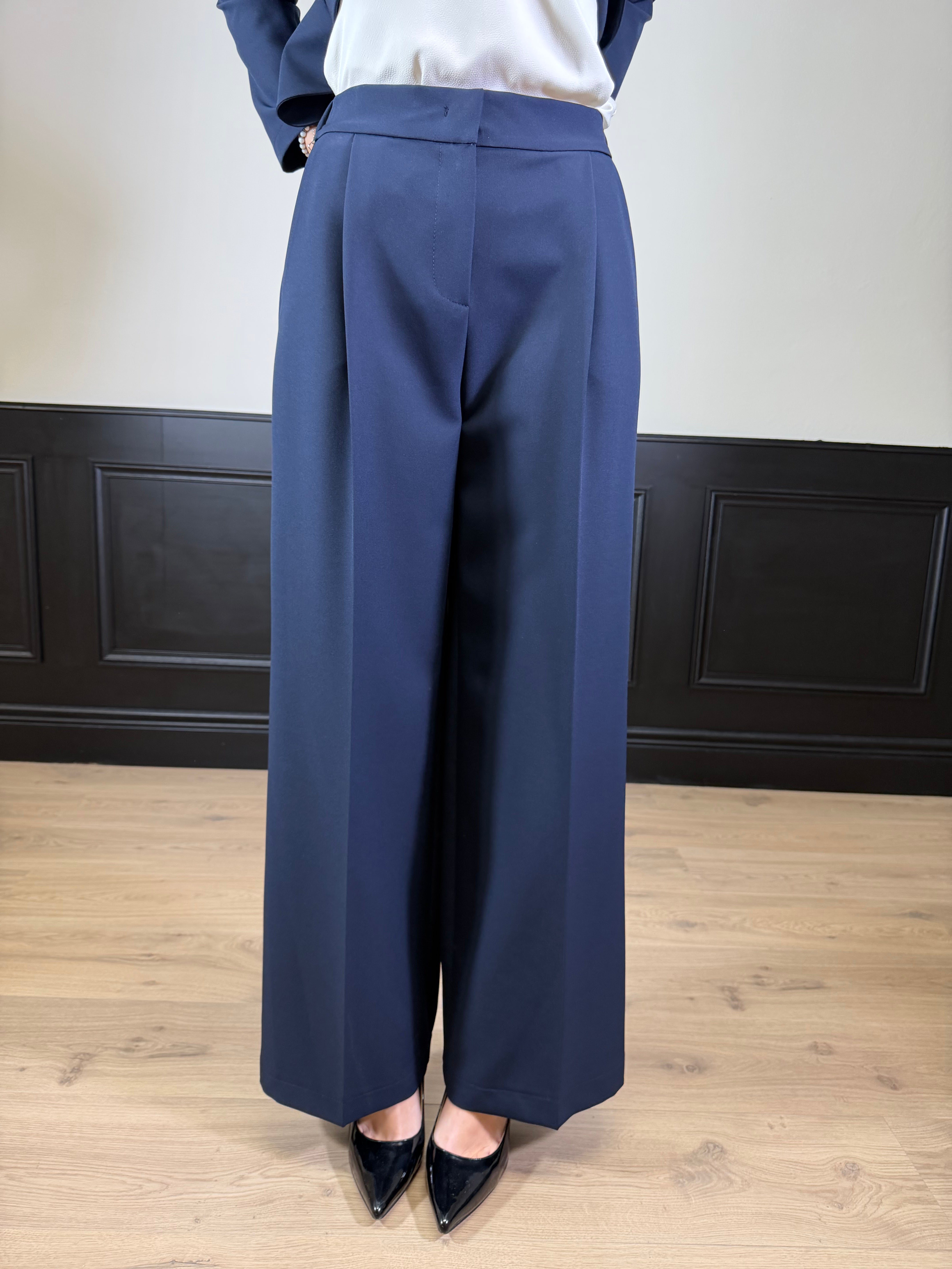 Pantalone palazzo con pence