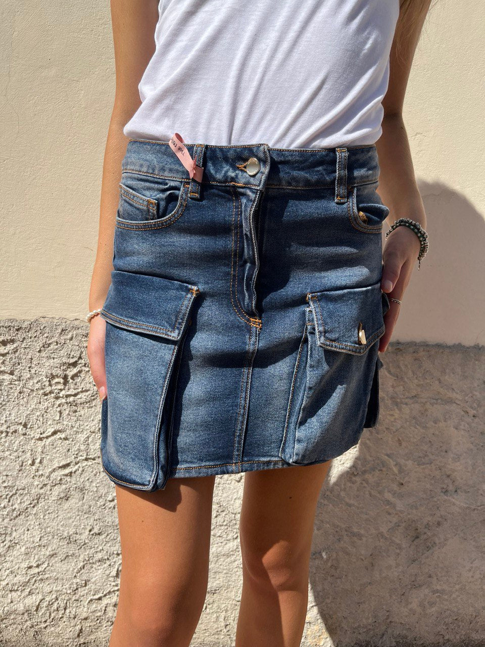 Mini gonna con tasconi in denim